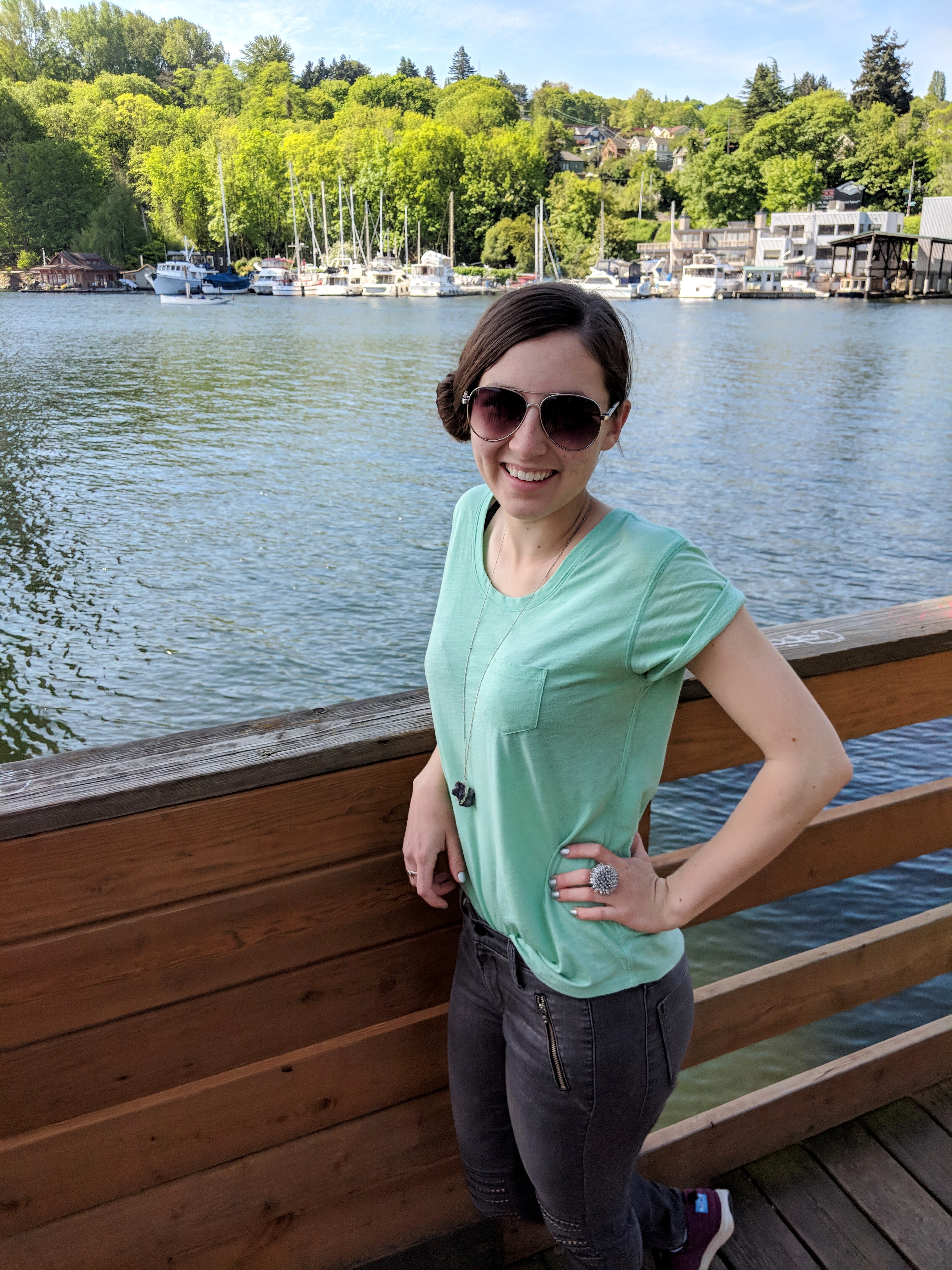 seafoam green t-shirt, grey jeans