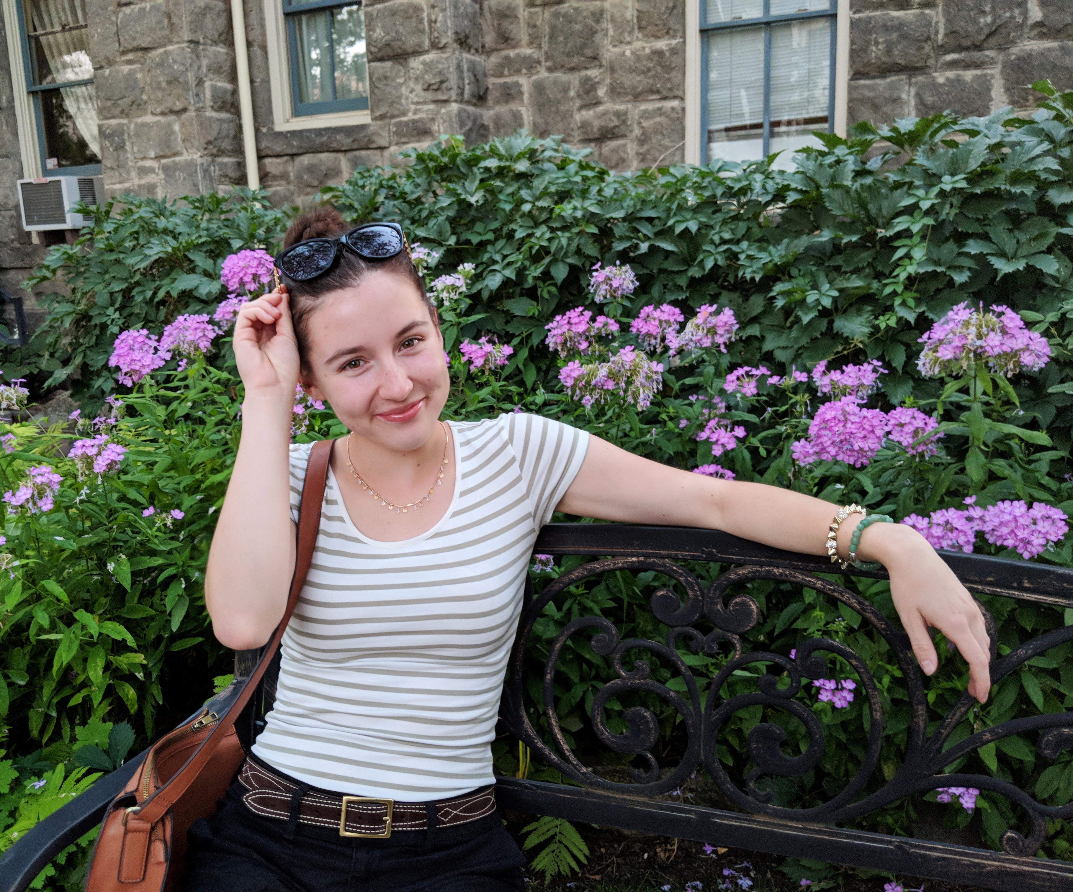 green stripe tee, black shorts, black sunglasses, dainty gold jewelry