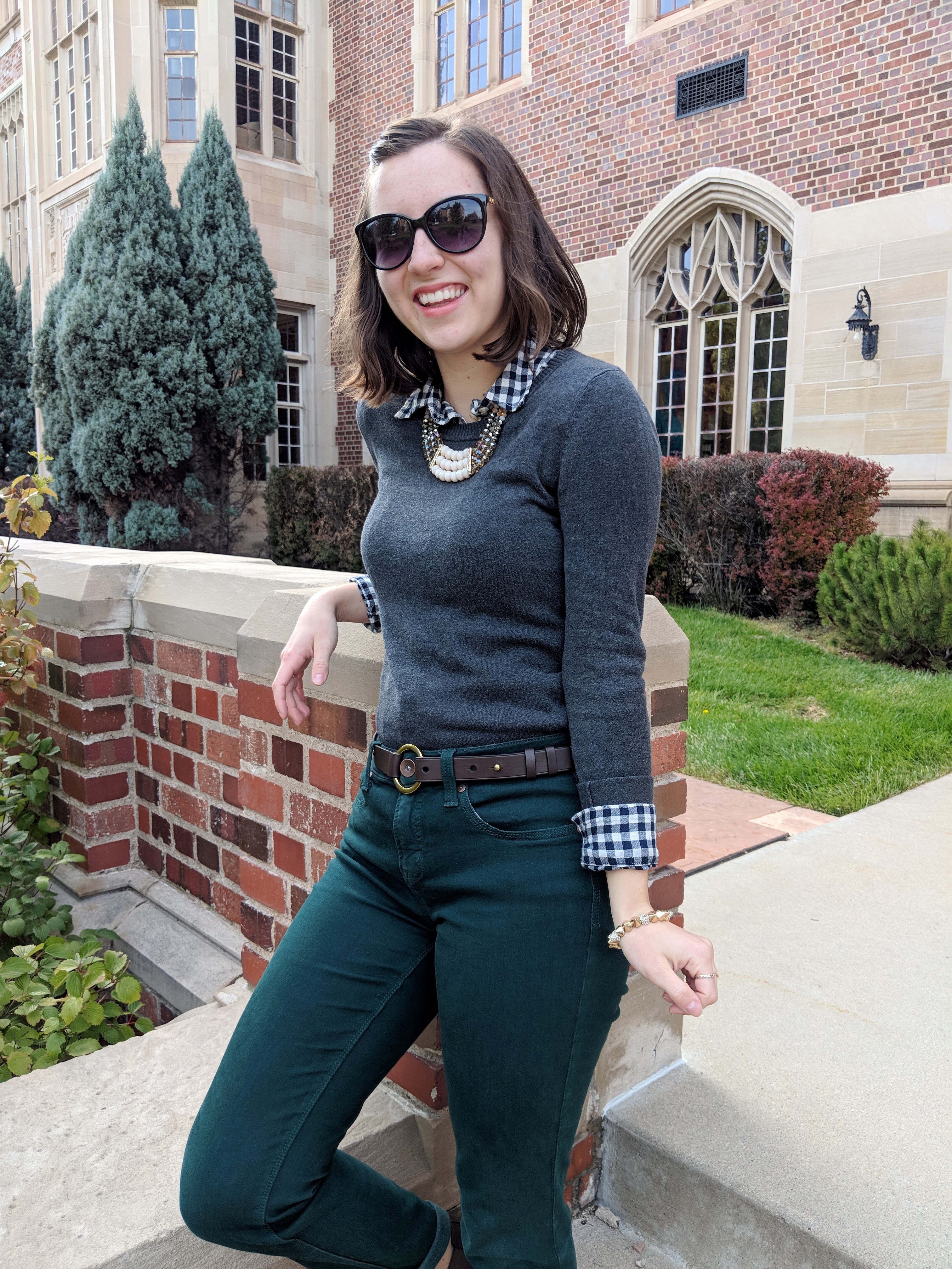 grey sweater, buffalo check shirt, green pants