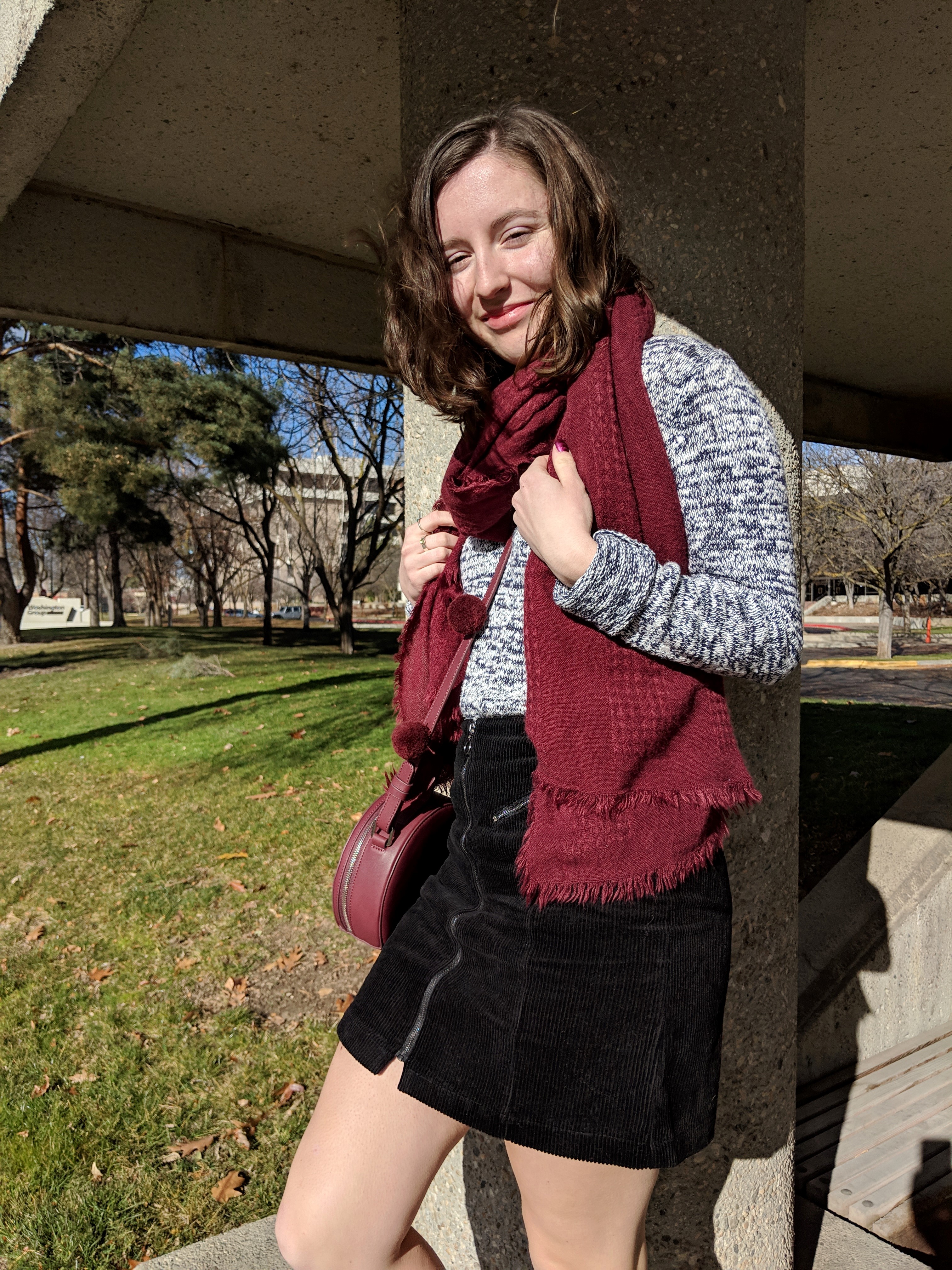 on trend accessories and zip front mini skirt