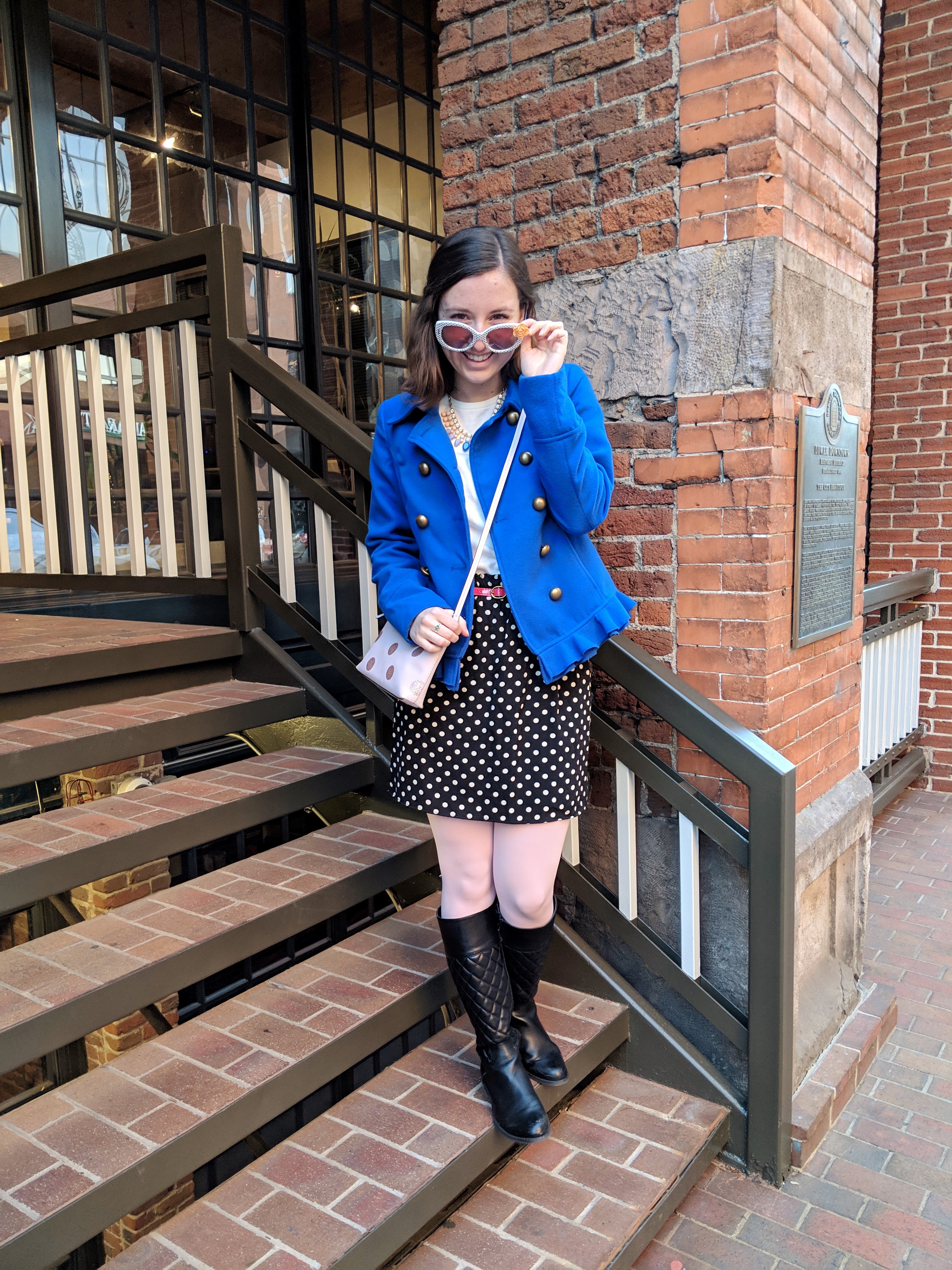 blue cobalt coat with polka dot skirt