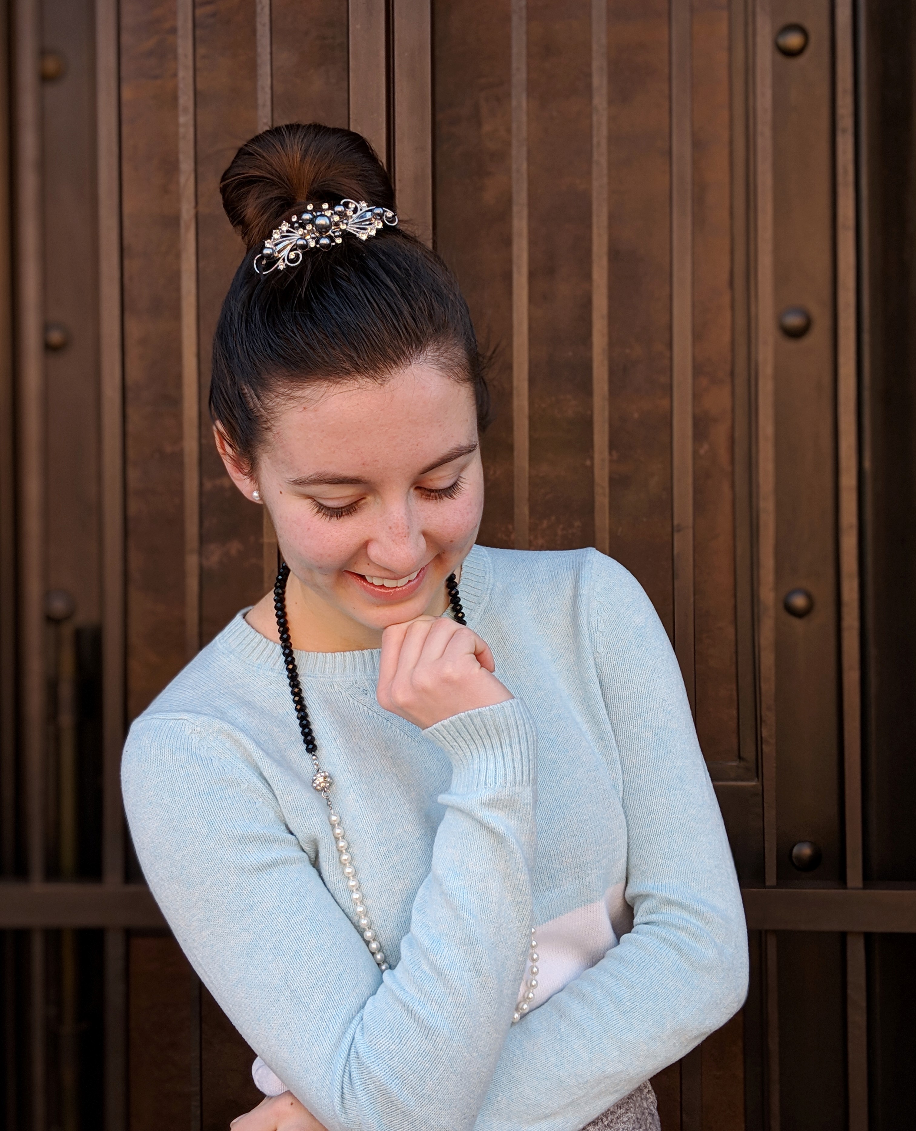pretty bun updo with pearl hair pin