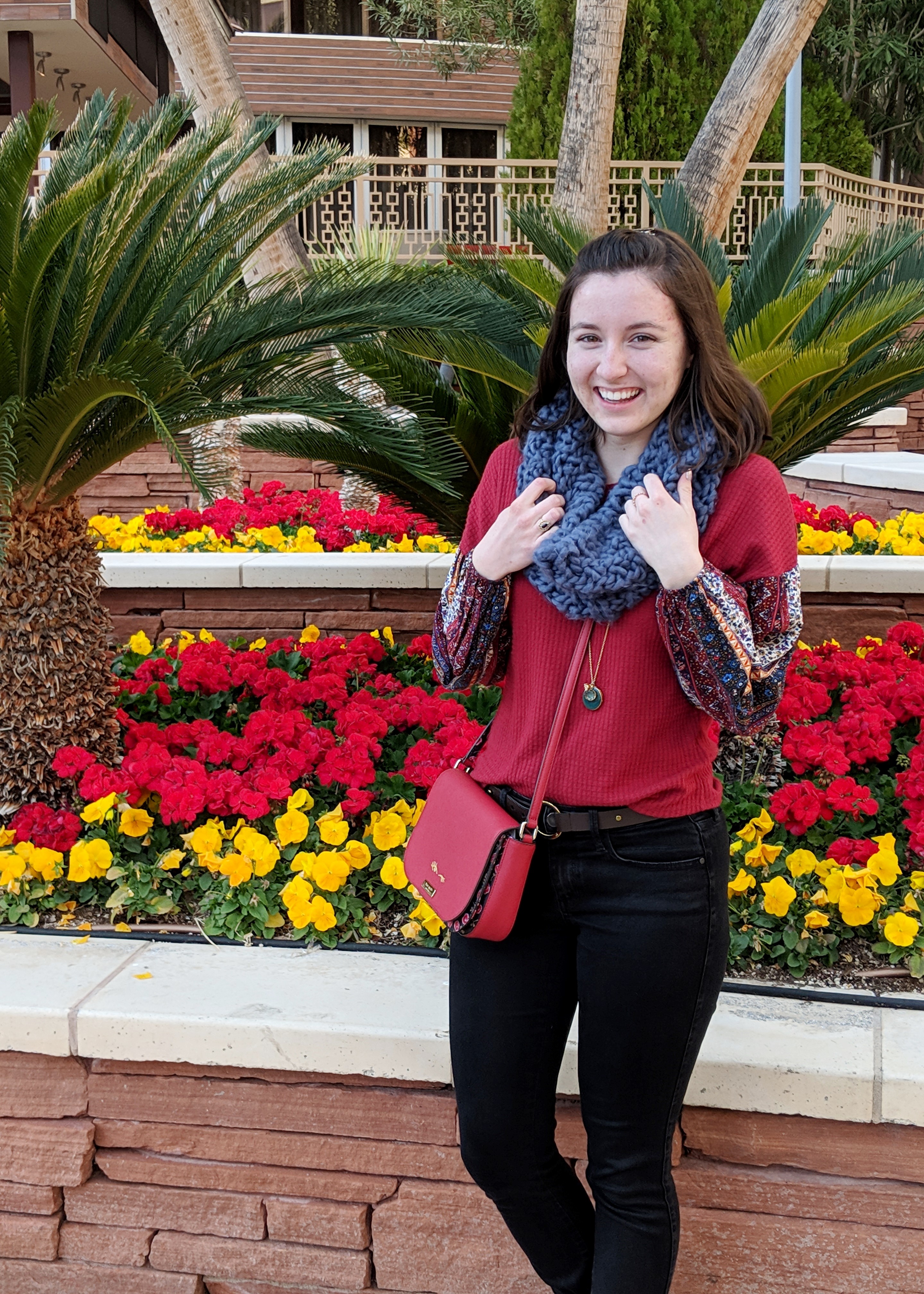 red patterned blouse blue infinity scarf