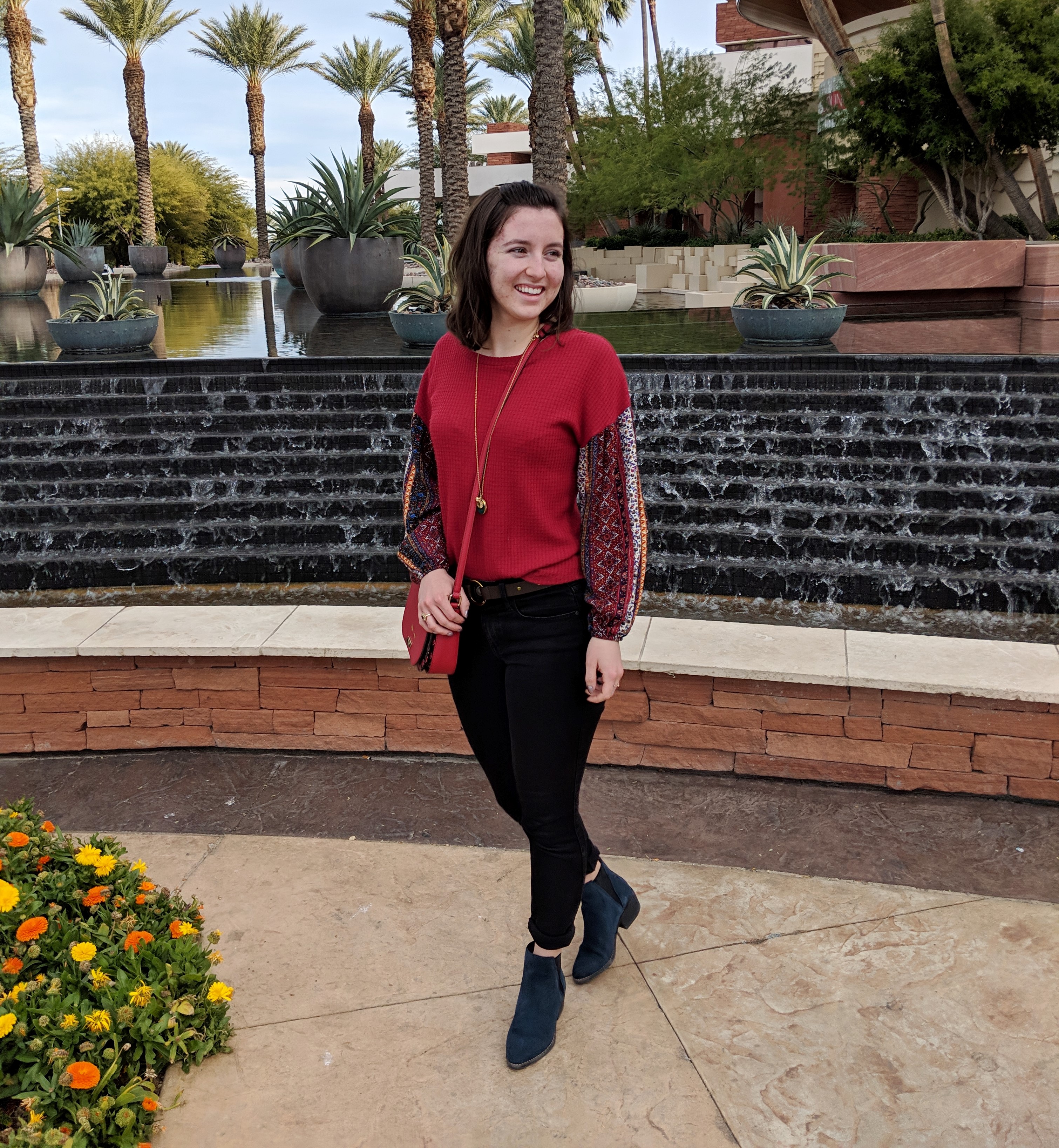 red patterned Francesca's blouse