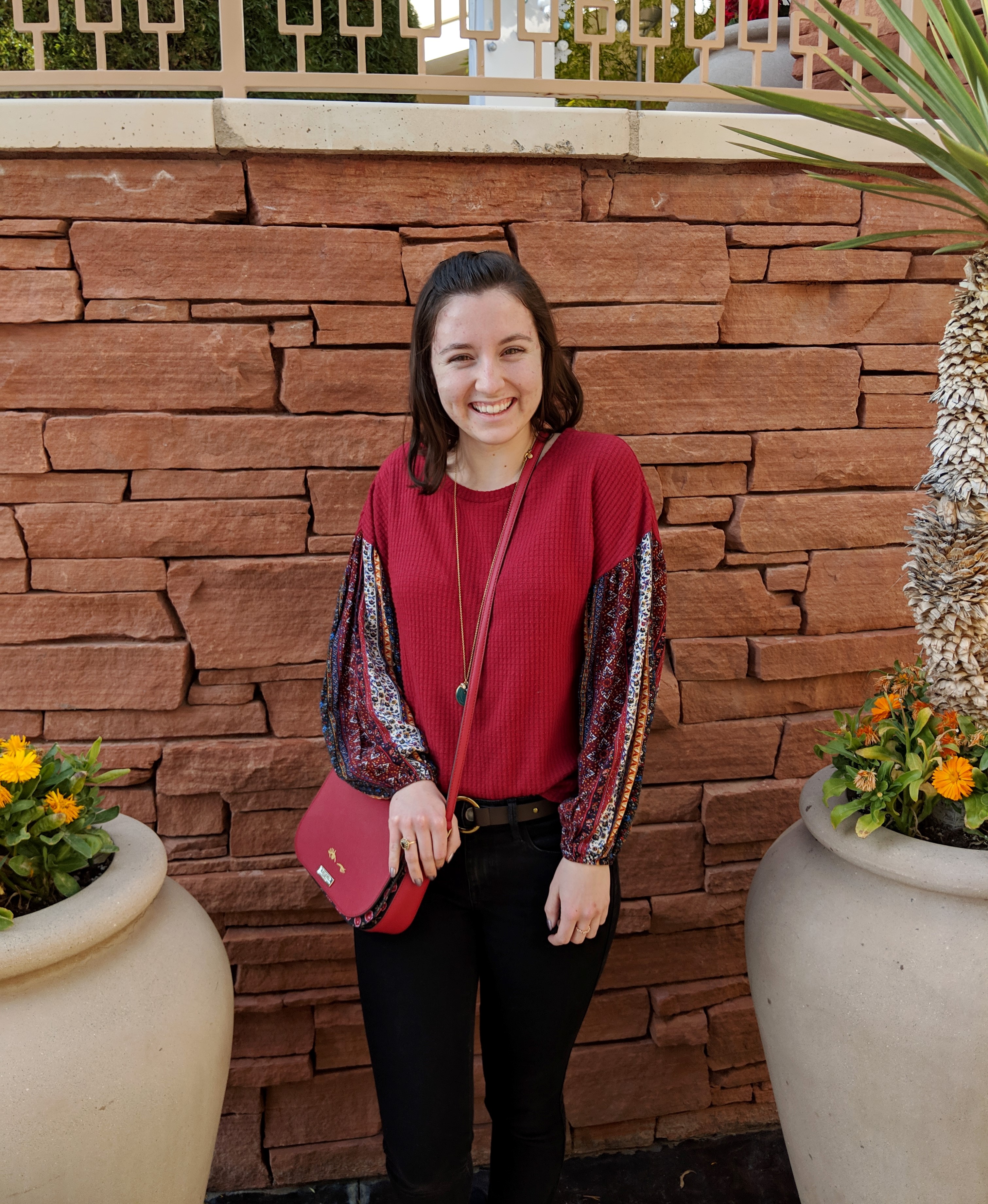 red patterned peasant sleeve blouse
