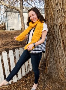 mustard yellow scarf and navy gingham vest to wear for the super bowl