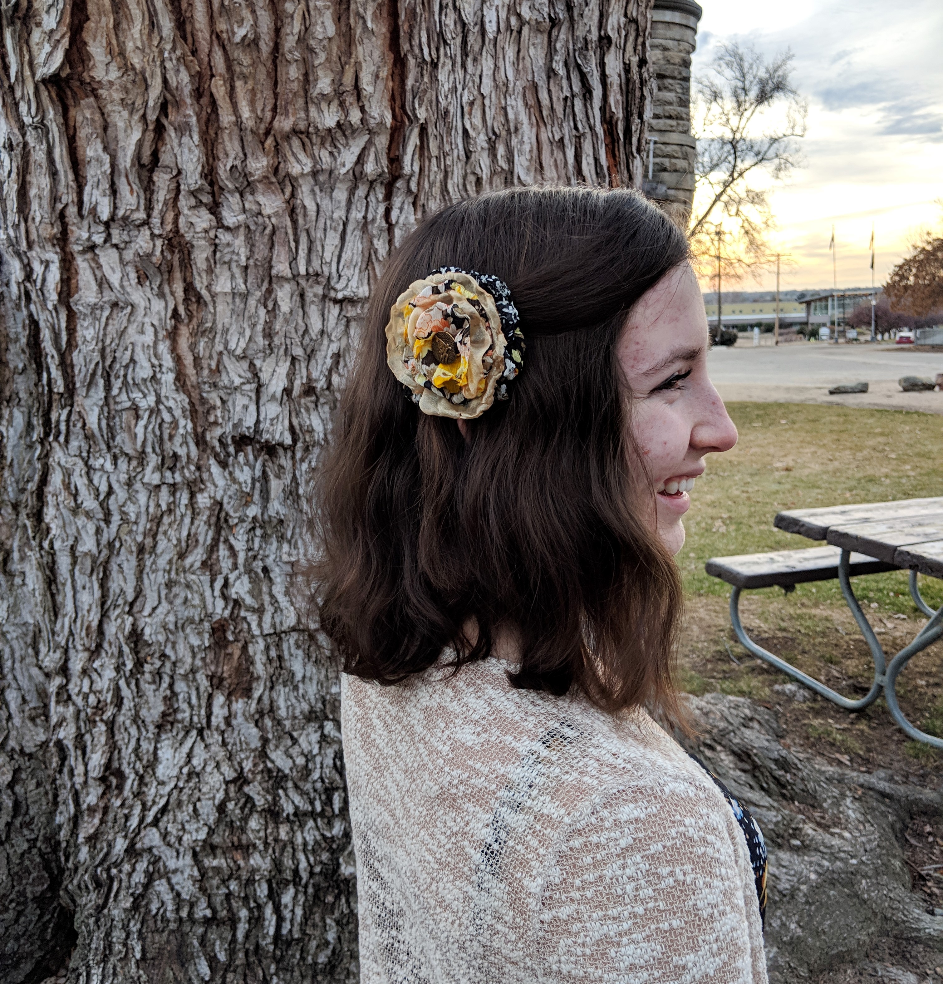 yellow flower in hair