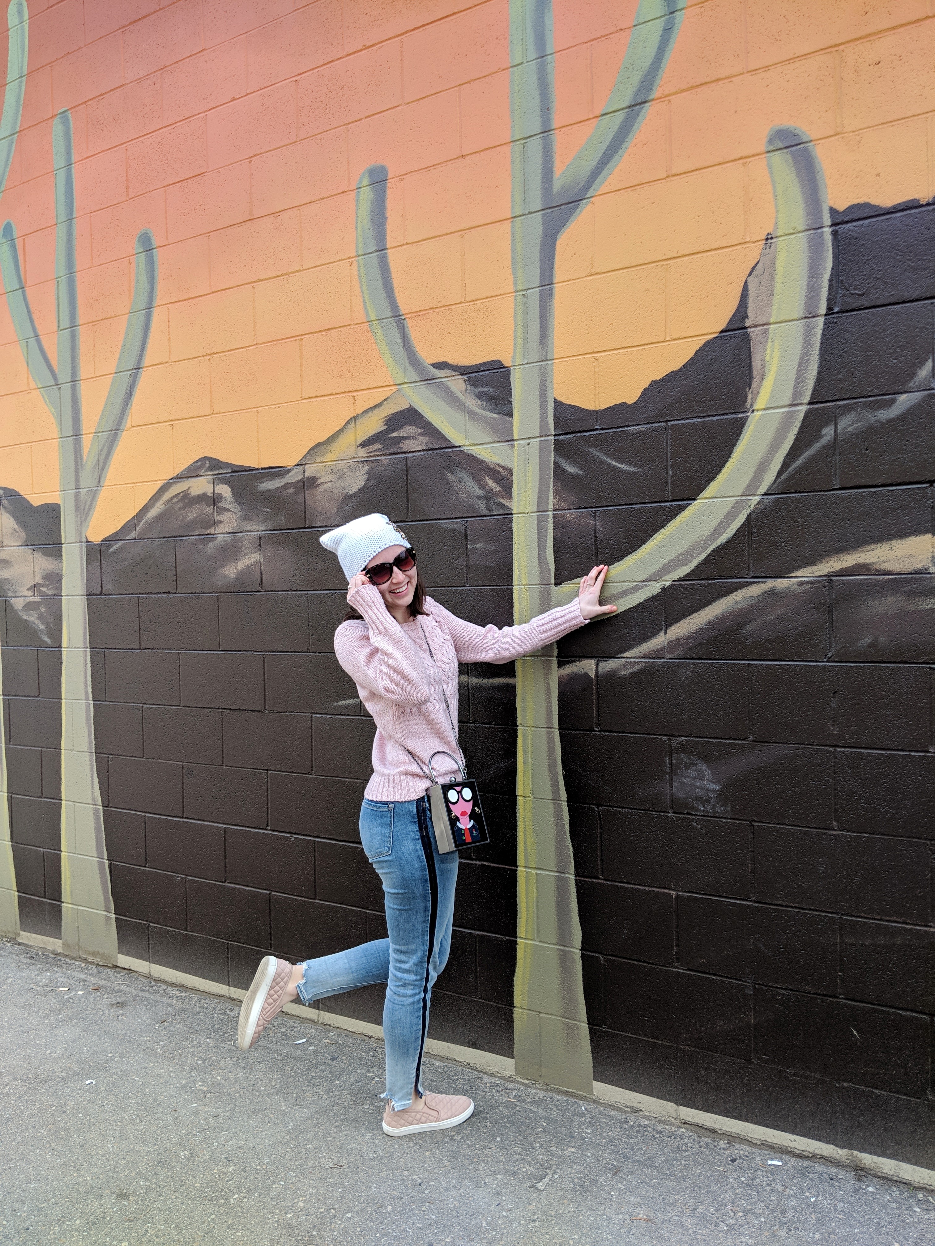 pink sweater white beanie