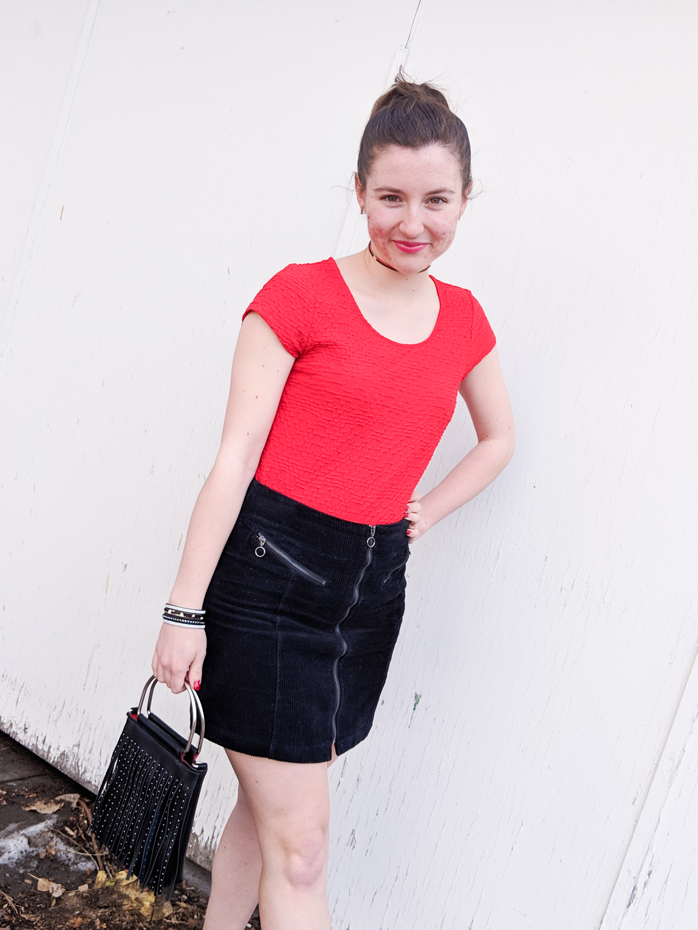 red blouse, black mini skirt