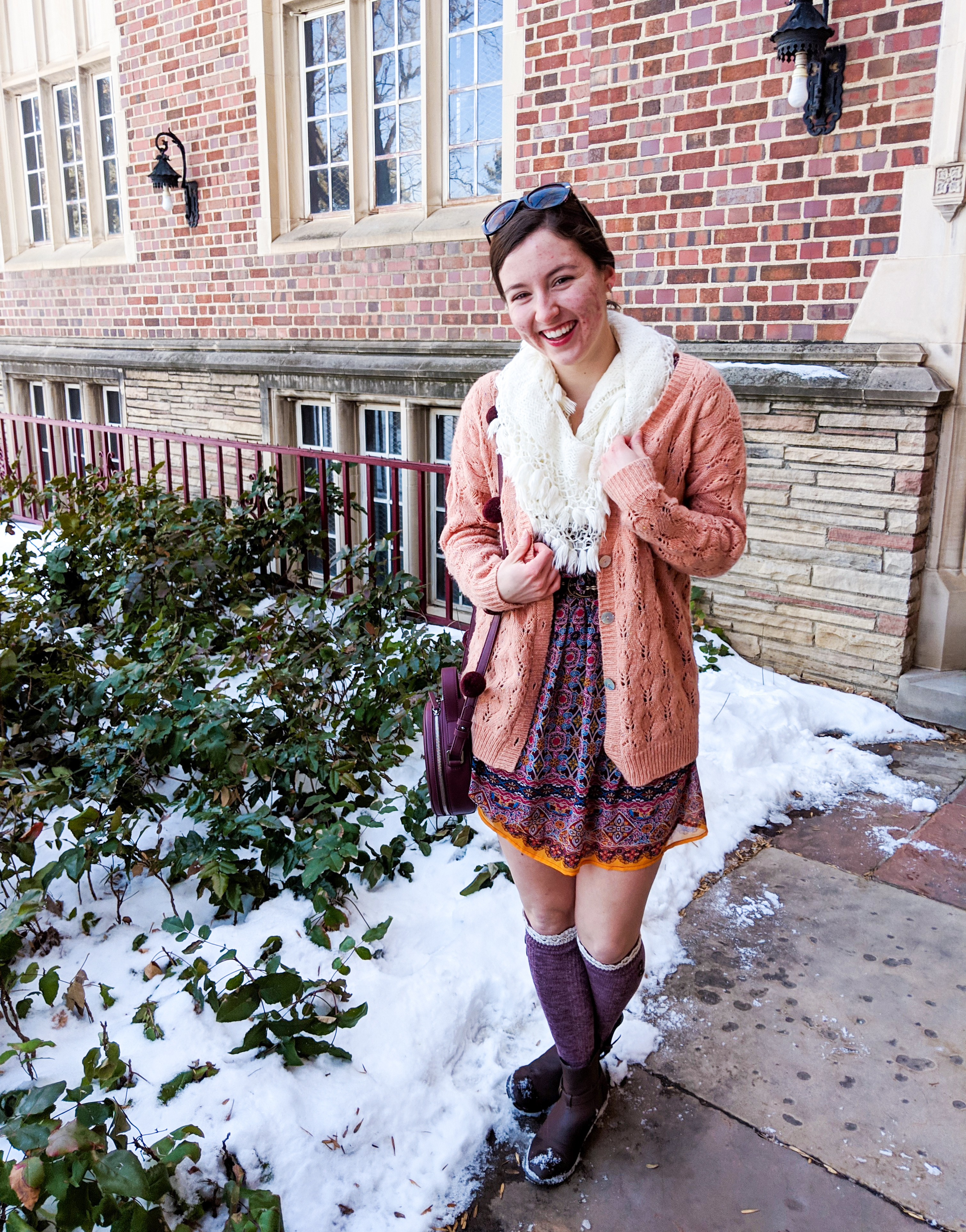 coral sweater, white infinity scarf