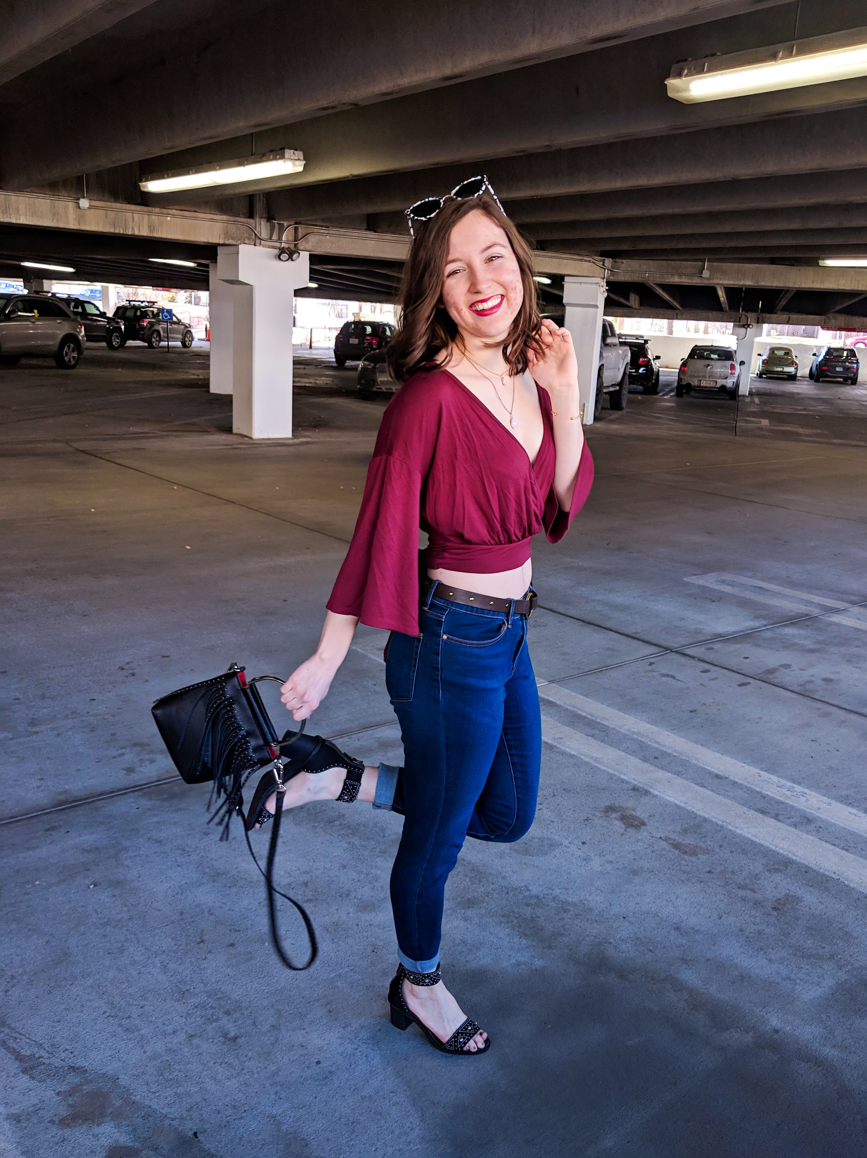 maroon v-neck top, black stud block heels