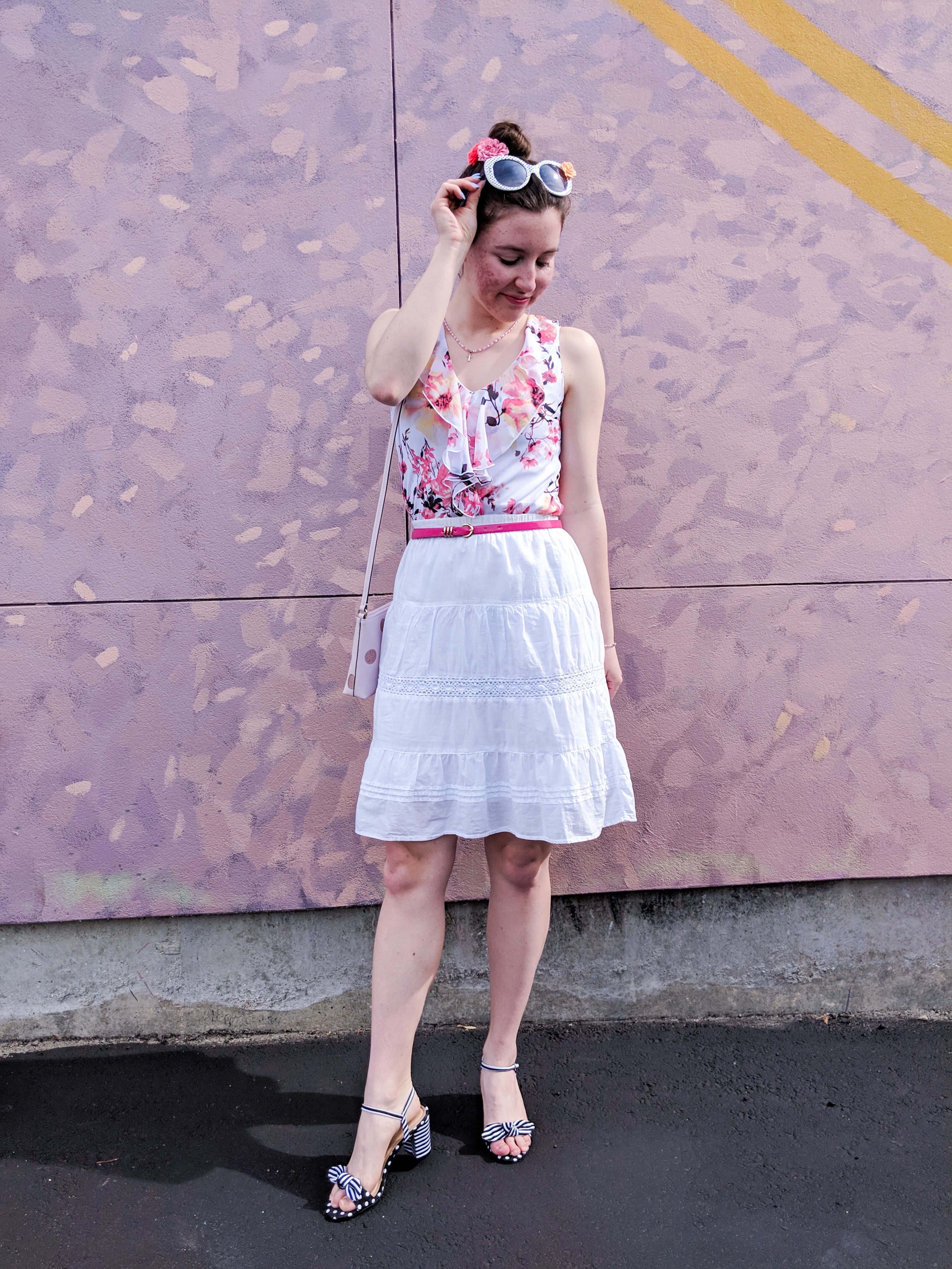 pink floral blouse, white skirt, striped heels