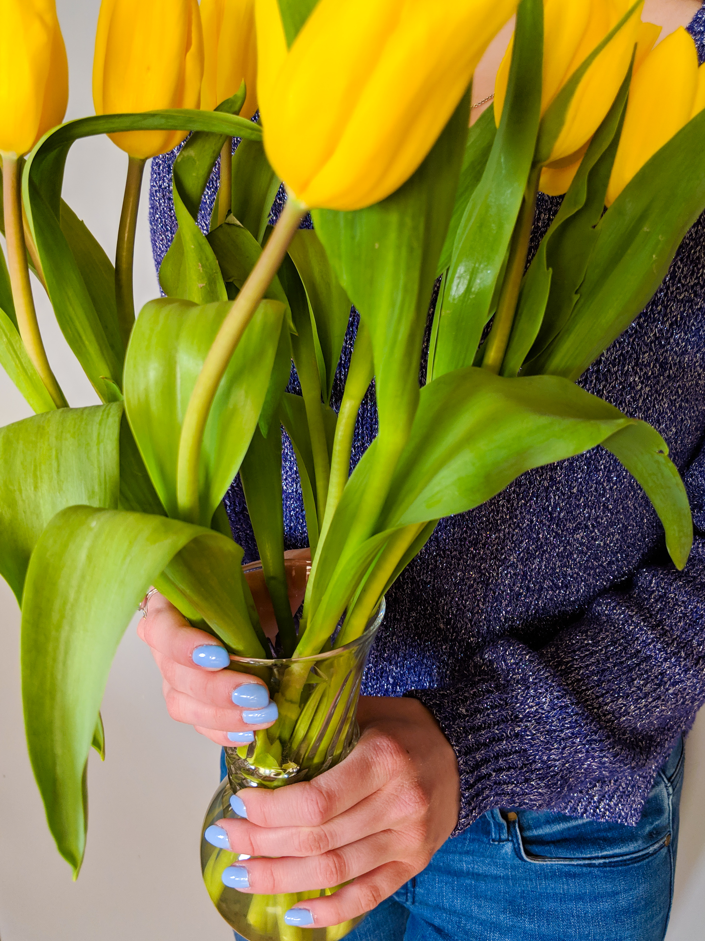 blue fingernails, yellow flowers, pastel nail polish