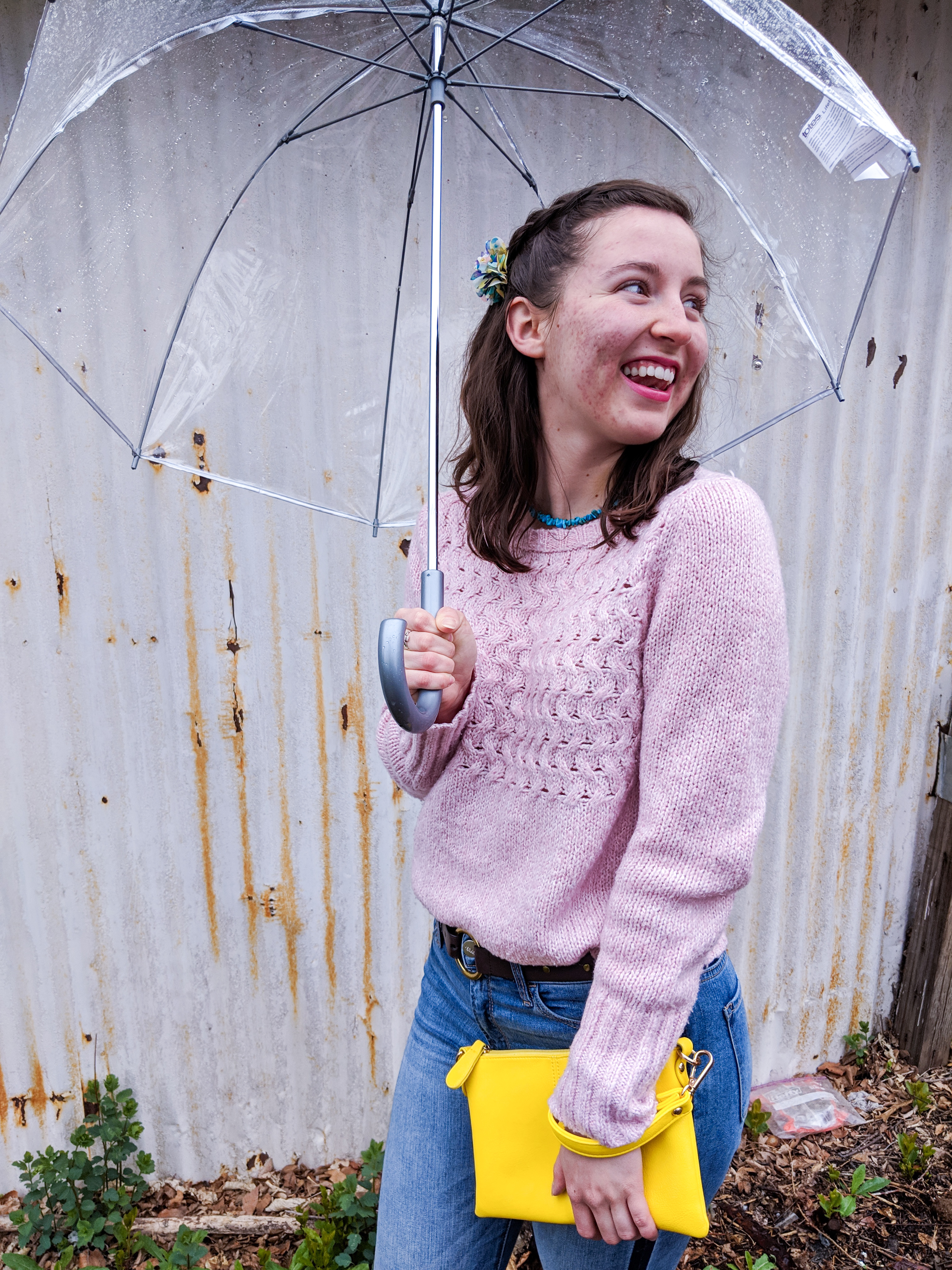 pink sweater, turquoise necklace, yellow purse, skinny jeans