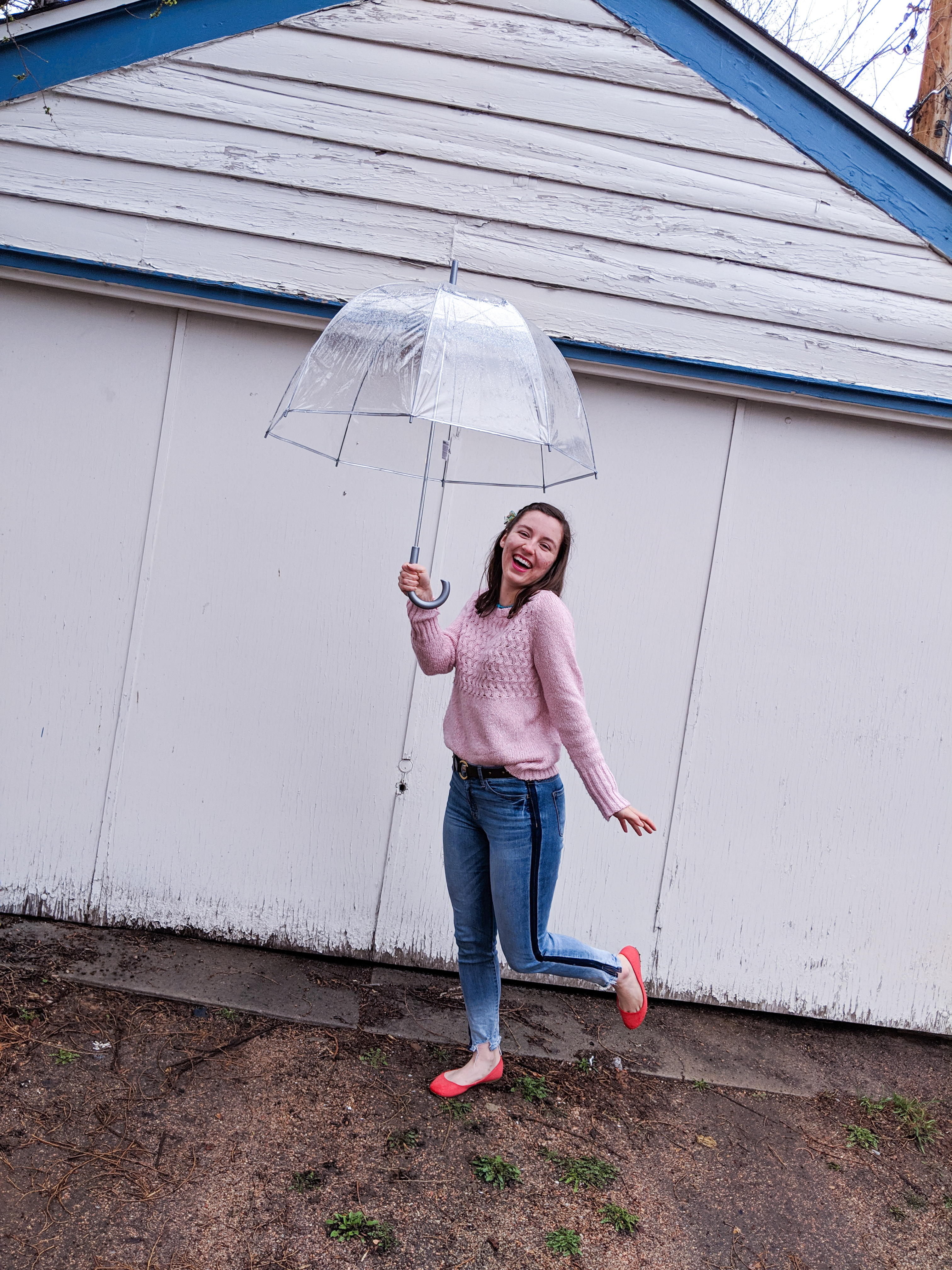 dancing in the rain, cute umbrella, orange shoes, pink sweater