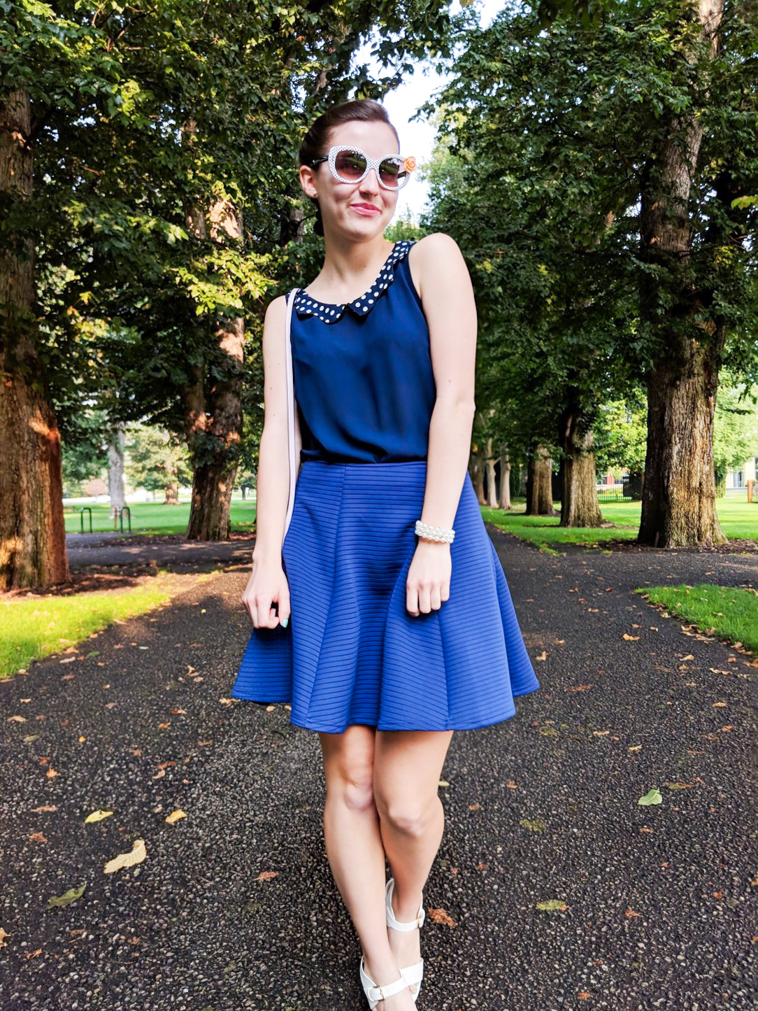 navy blouse, navy skirt, spring outfit, white heels