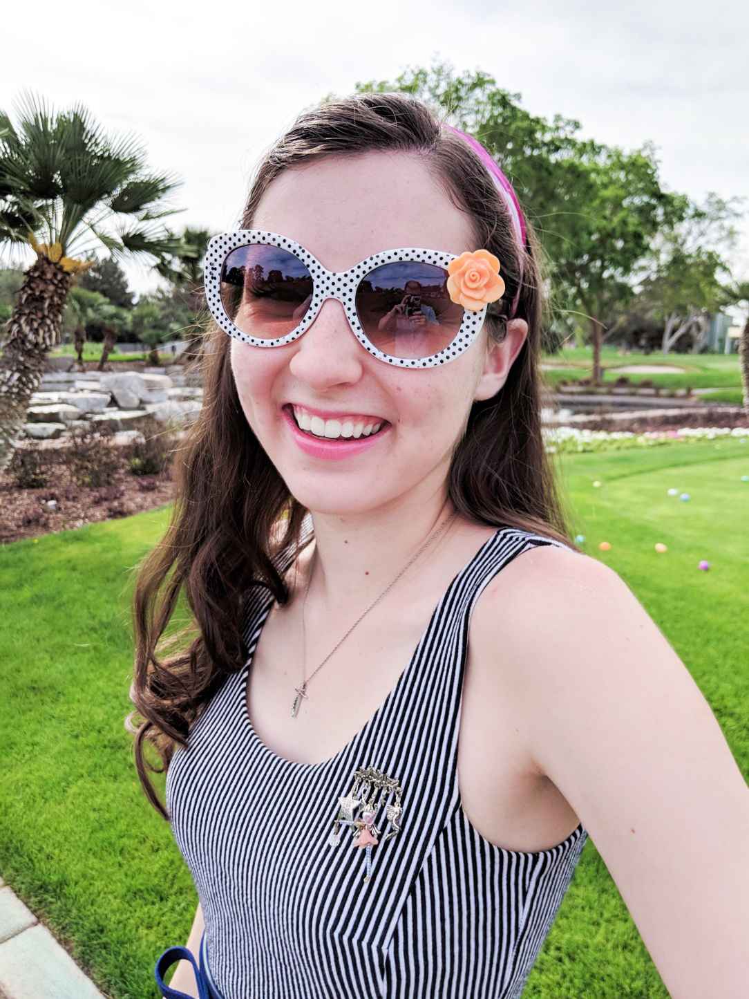 pinstripe dress, polka dot sunglasses, brooch, cross necklace, Easter egg hunt
