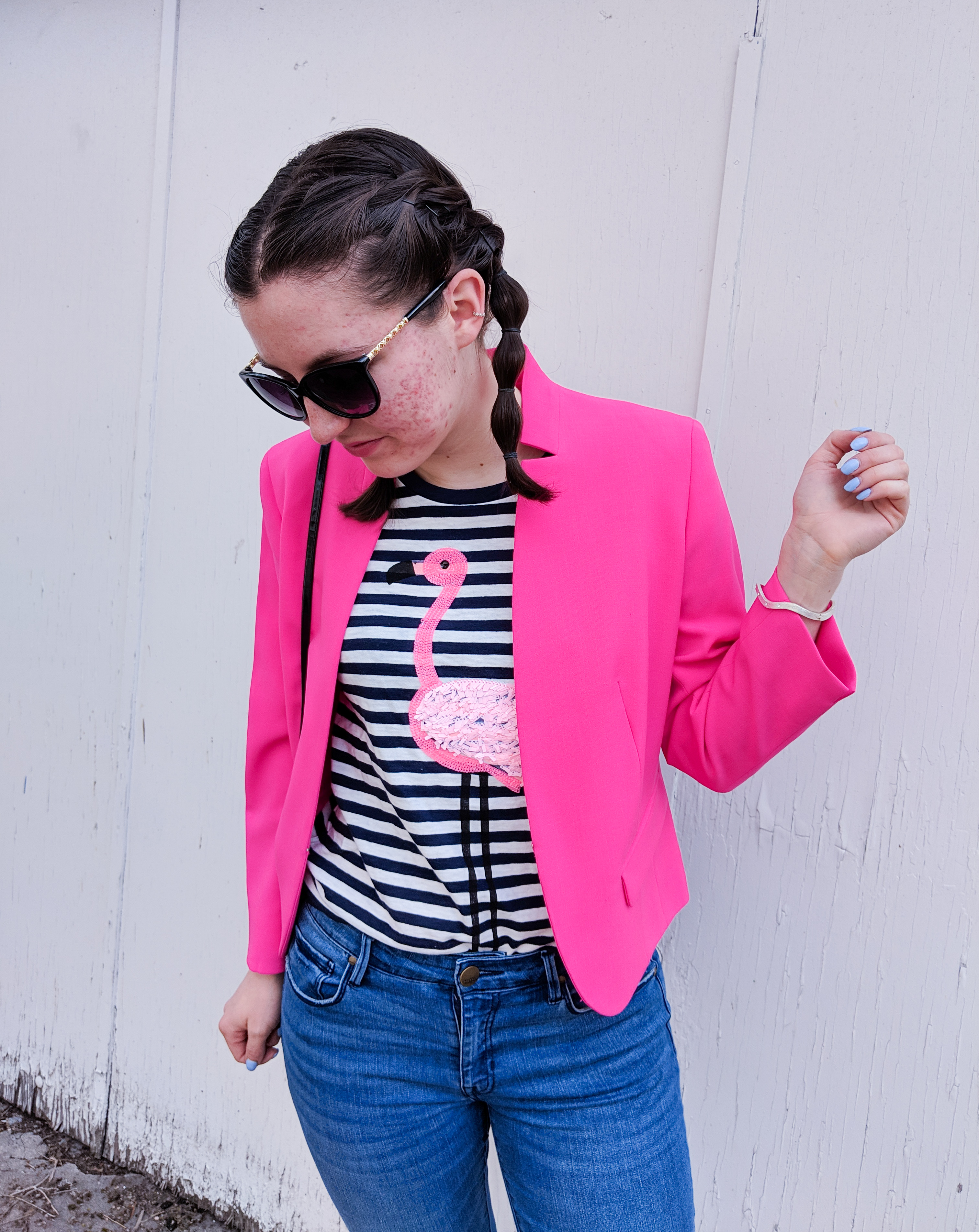 pink blazer, striped flamingo tee, blue nails