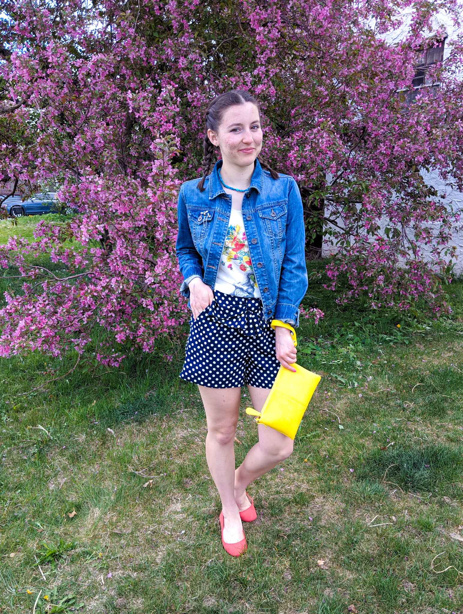 jean jacket, floral graphic tee, polka dot shorts, yellow purse, orange shoes