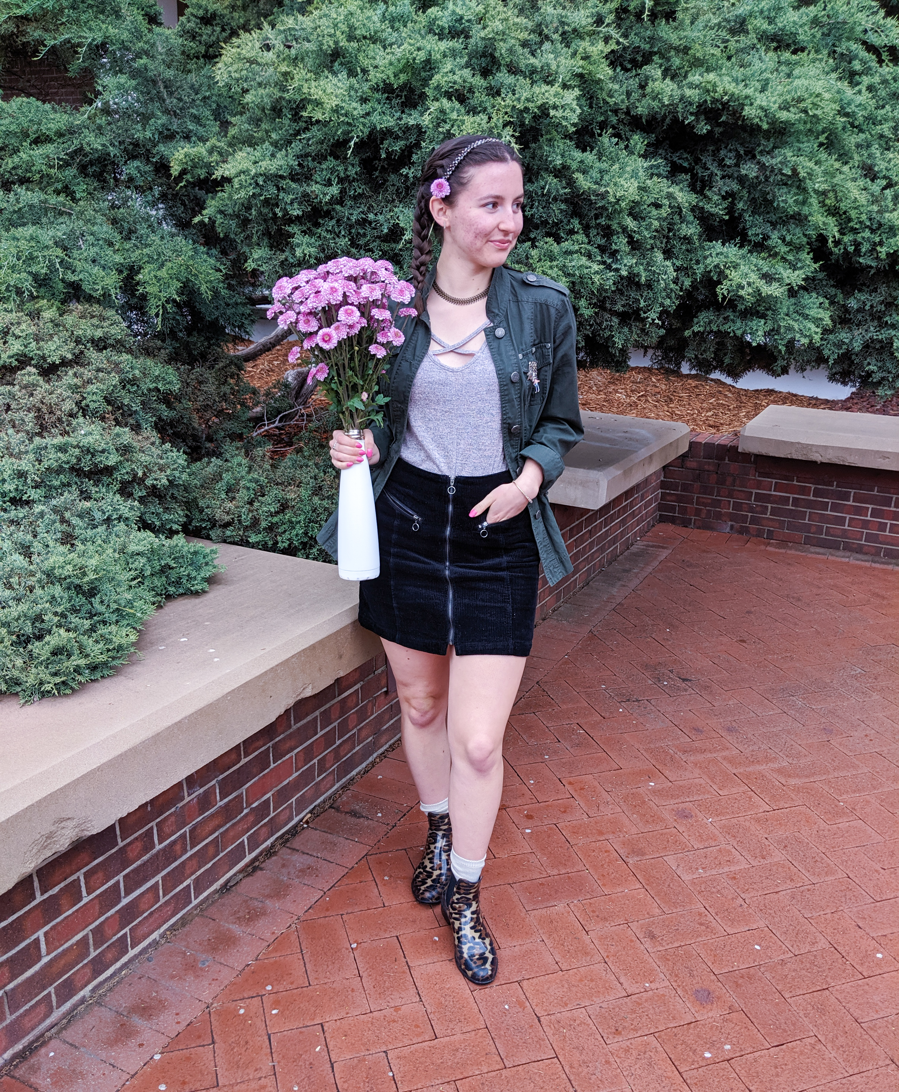 pink flowers, leopard rain booties, black skirt, blush top, green military jacket