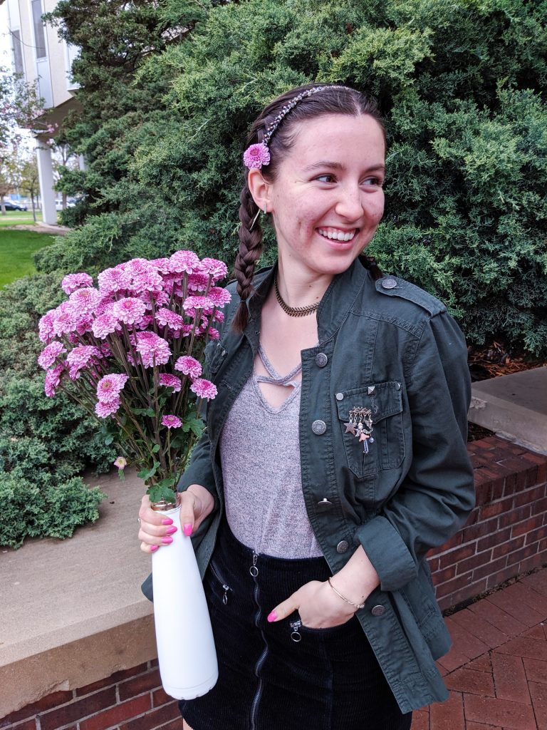 purple flowers, mums, green army jacket, blush shirt, sparkly headband
