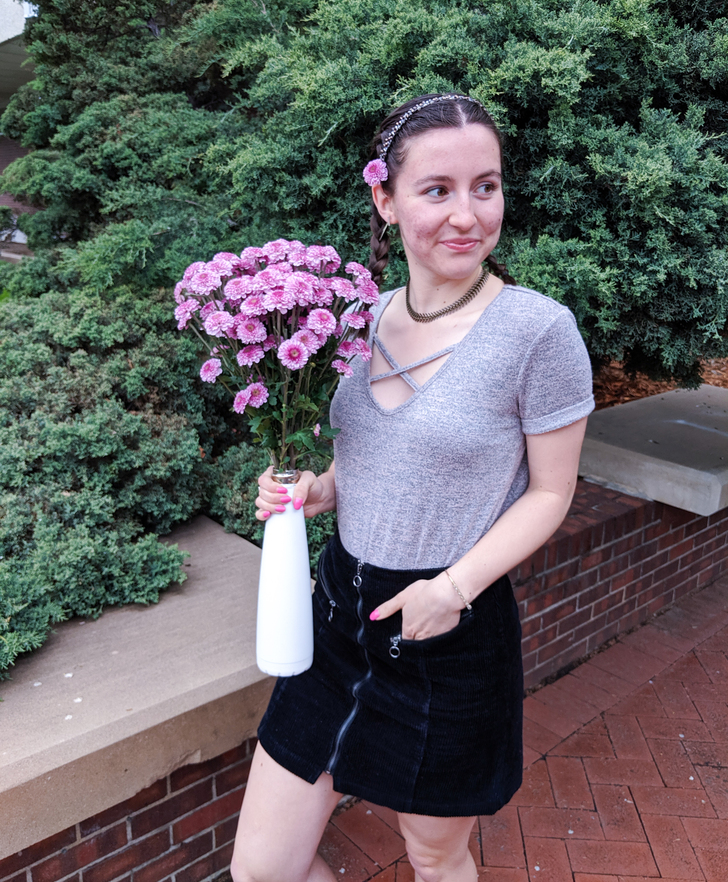 blush t-shirt, black corduroy skirt, pink flowers