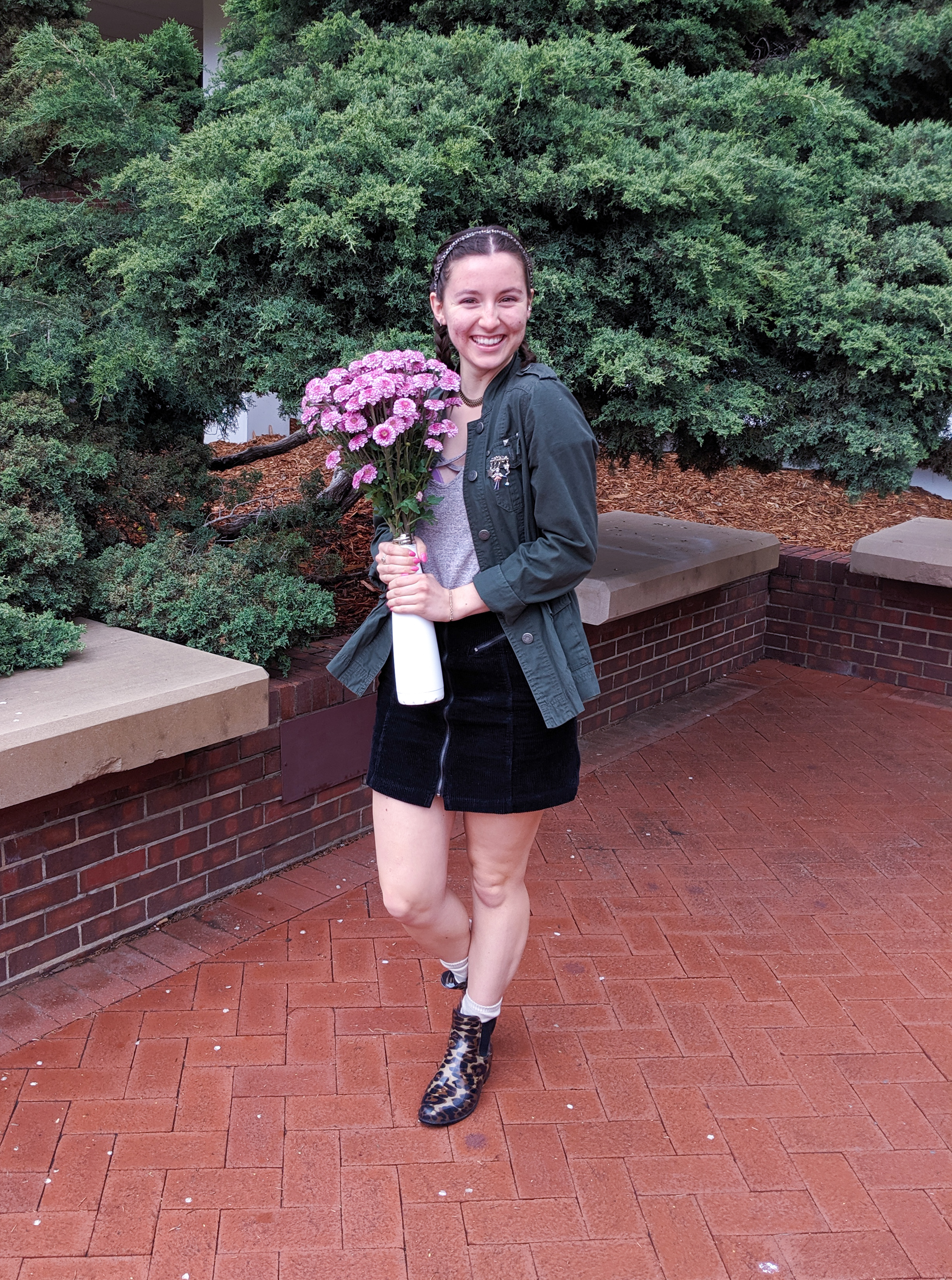 pink flowers, leopard rain boots, black mini skirt, blush shirt, green army jacket