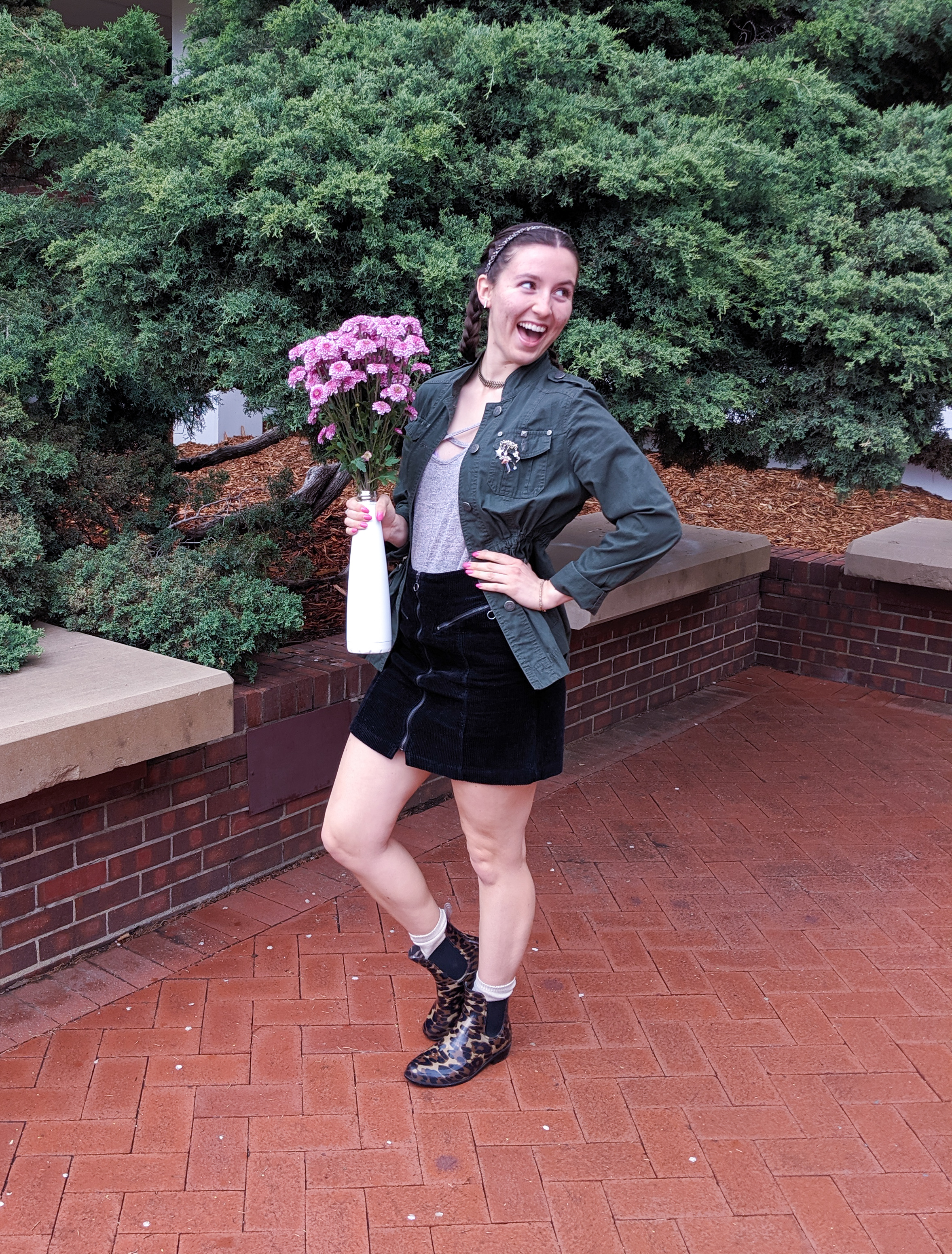 olive green jacket, black skirt, goofy photoshotos