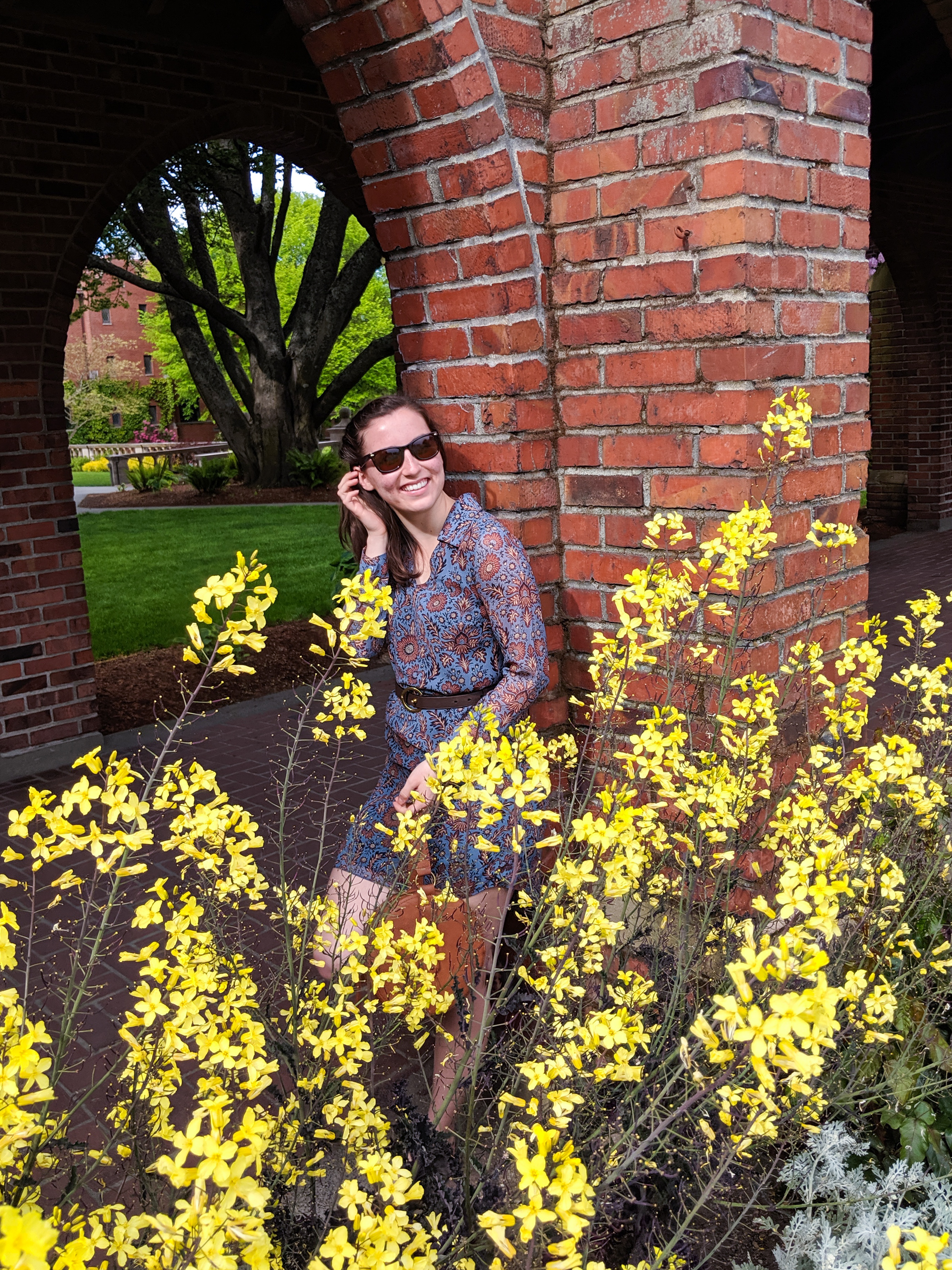 yellow flowers, blue patterned dress, University of Puget Sound