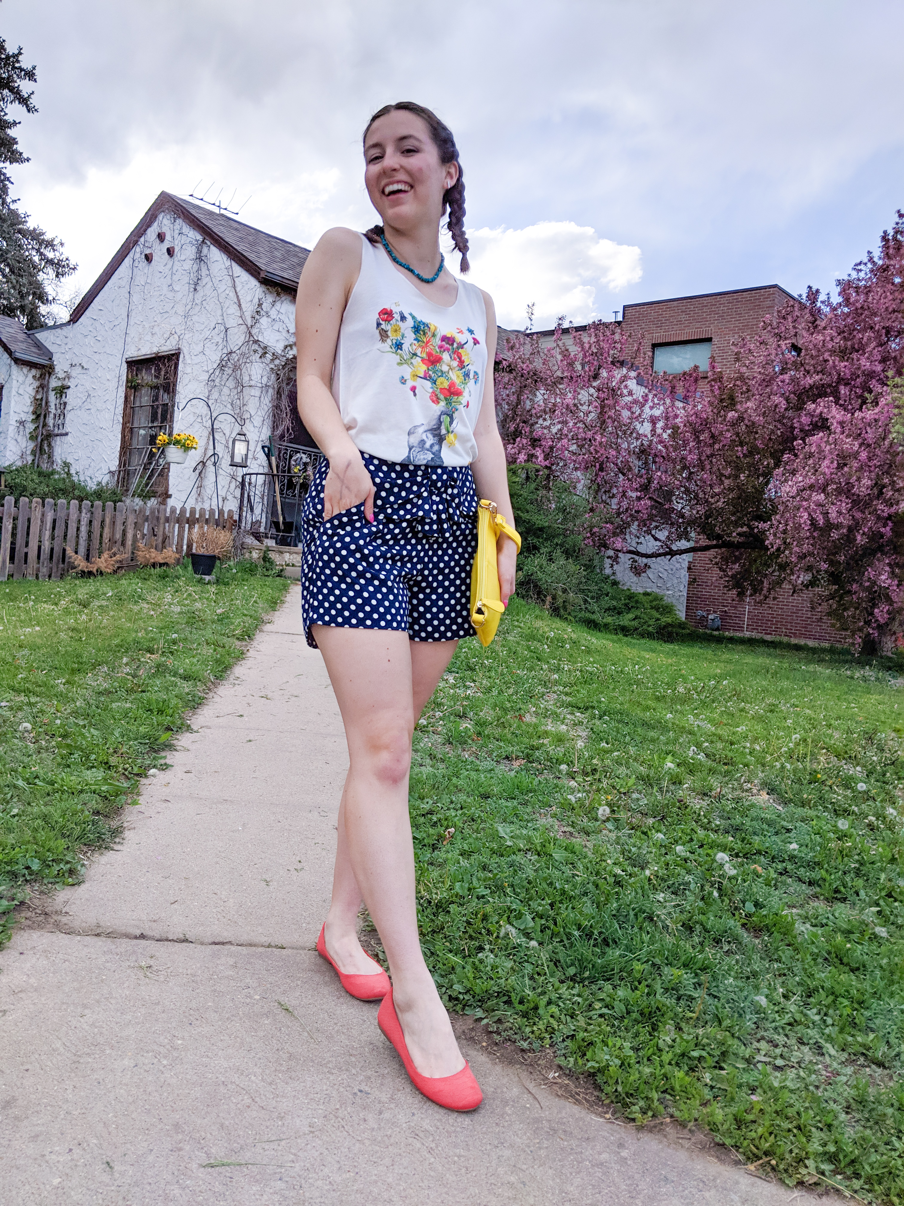 floral graphic tee, polka dot shorts, orange flats