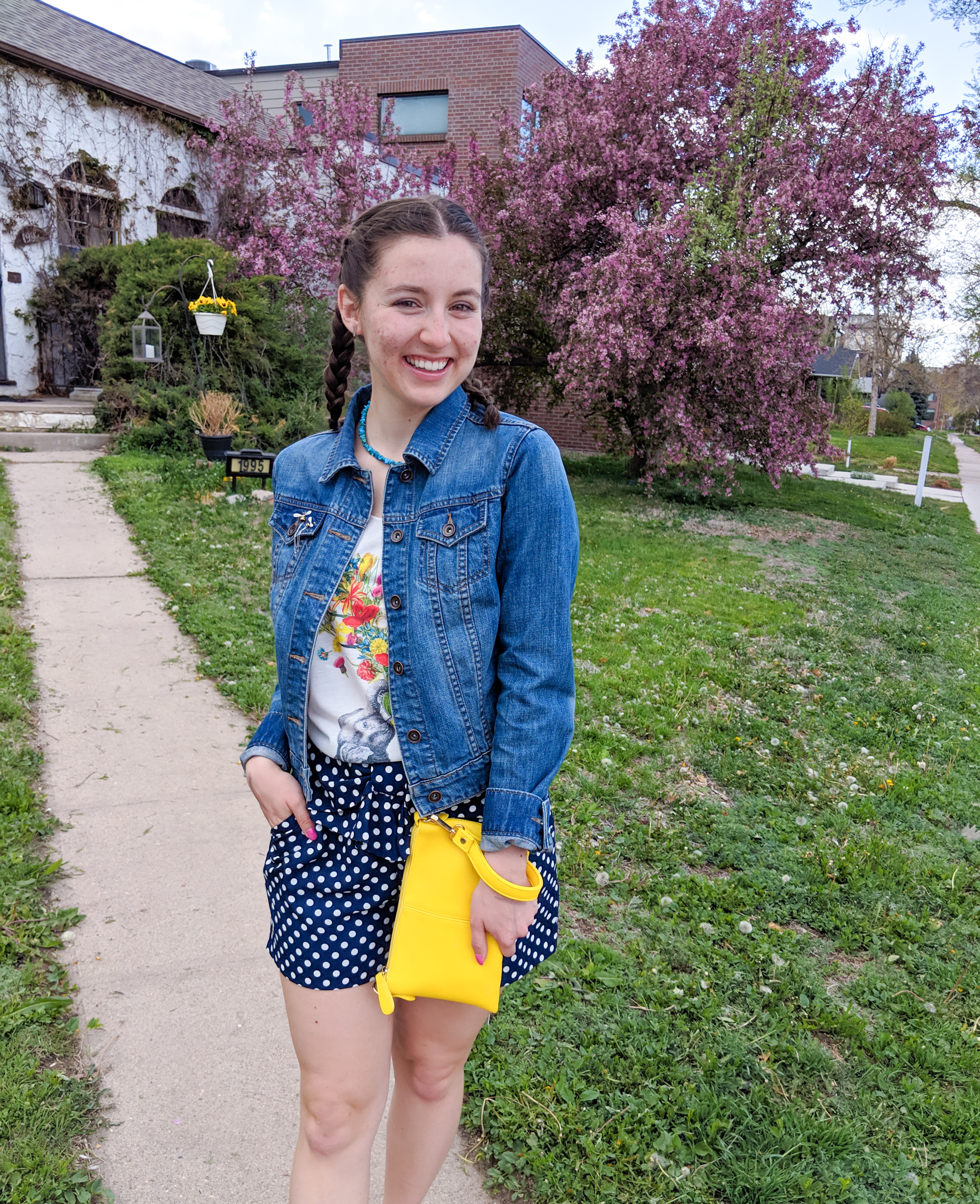 jean jacket, yellow purse, floral graphic tee, polka dot shorts