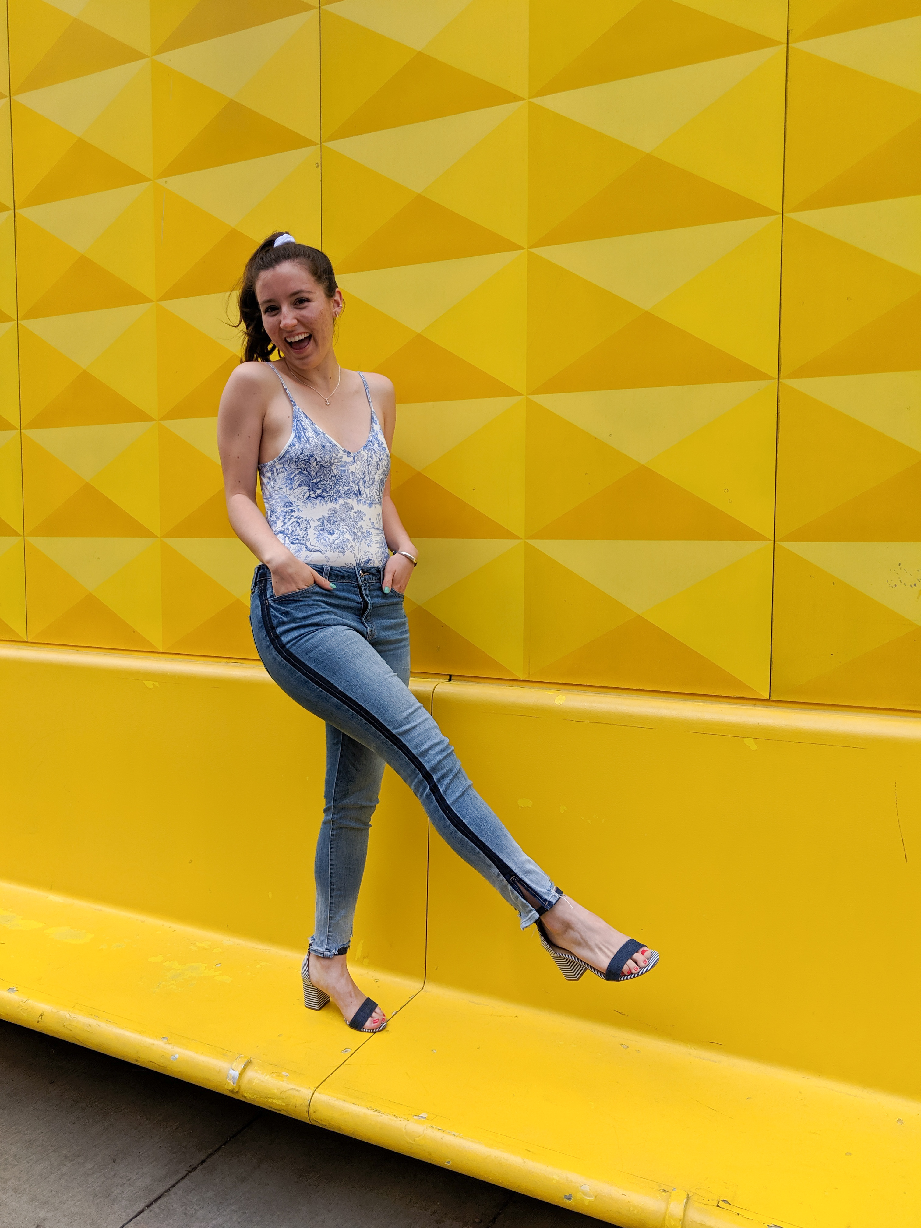 blue and white bodysuit, tuxedo striped jeans, striped heels