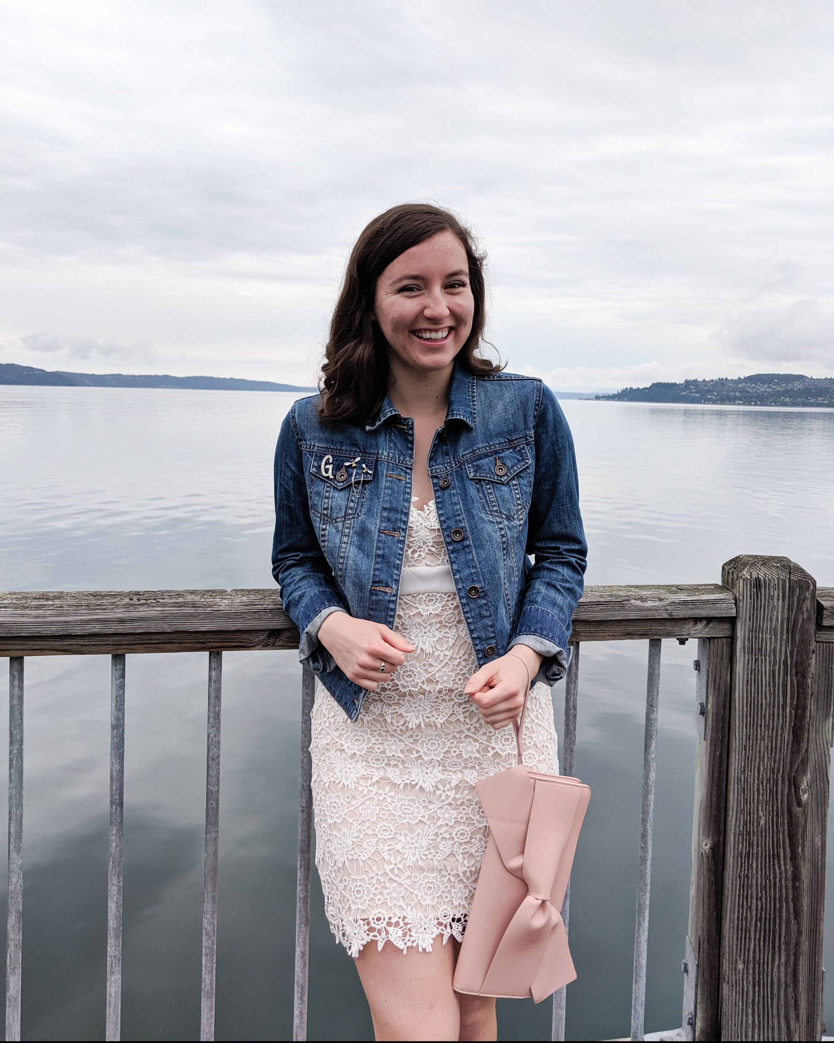 white lace dress, denim jacket, blush clutch