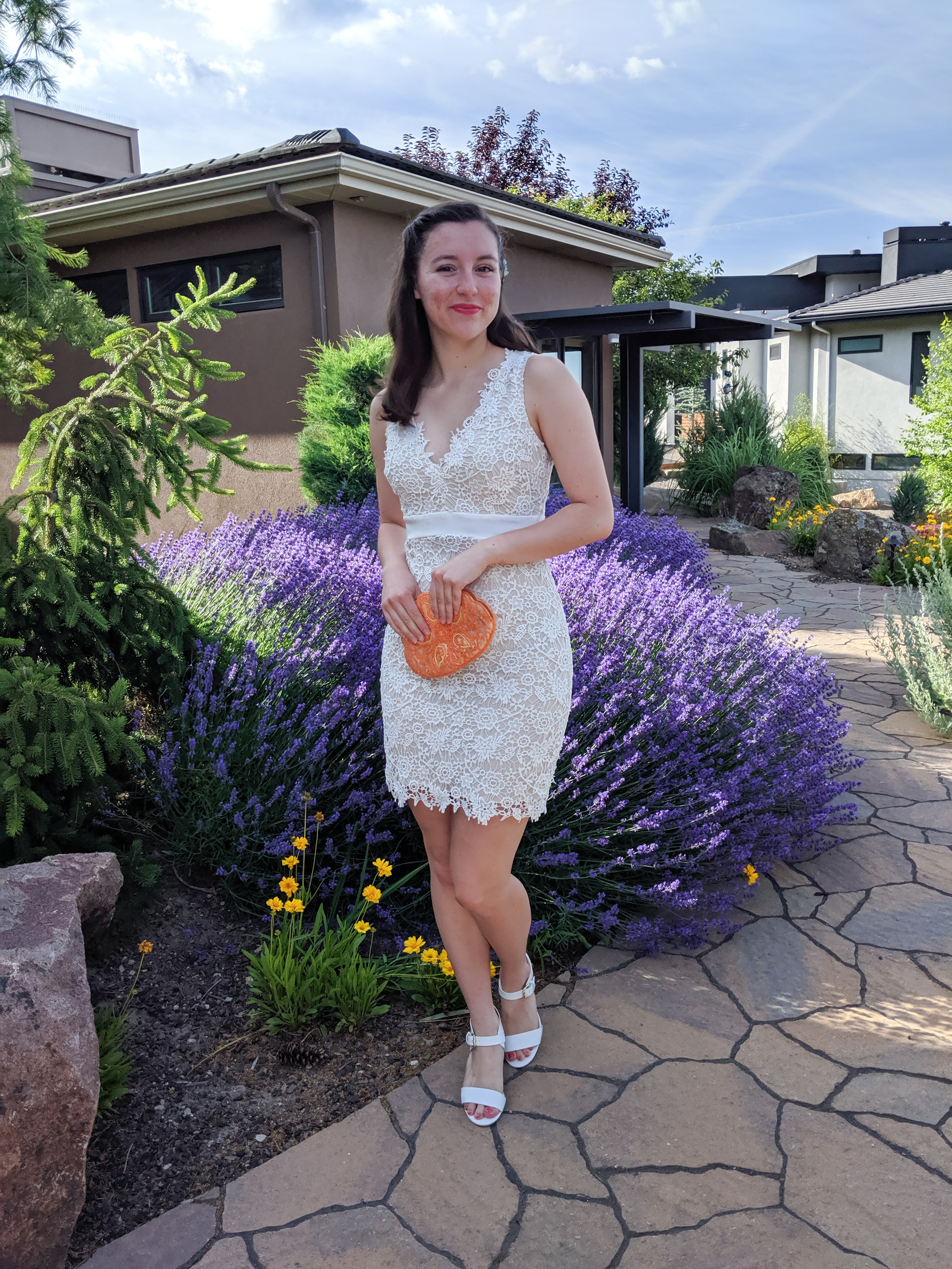 white lace dress, lavender, white heels, orange purse