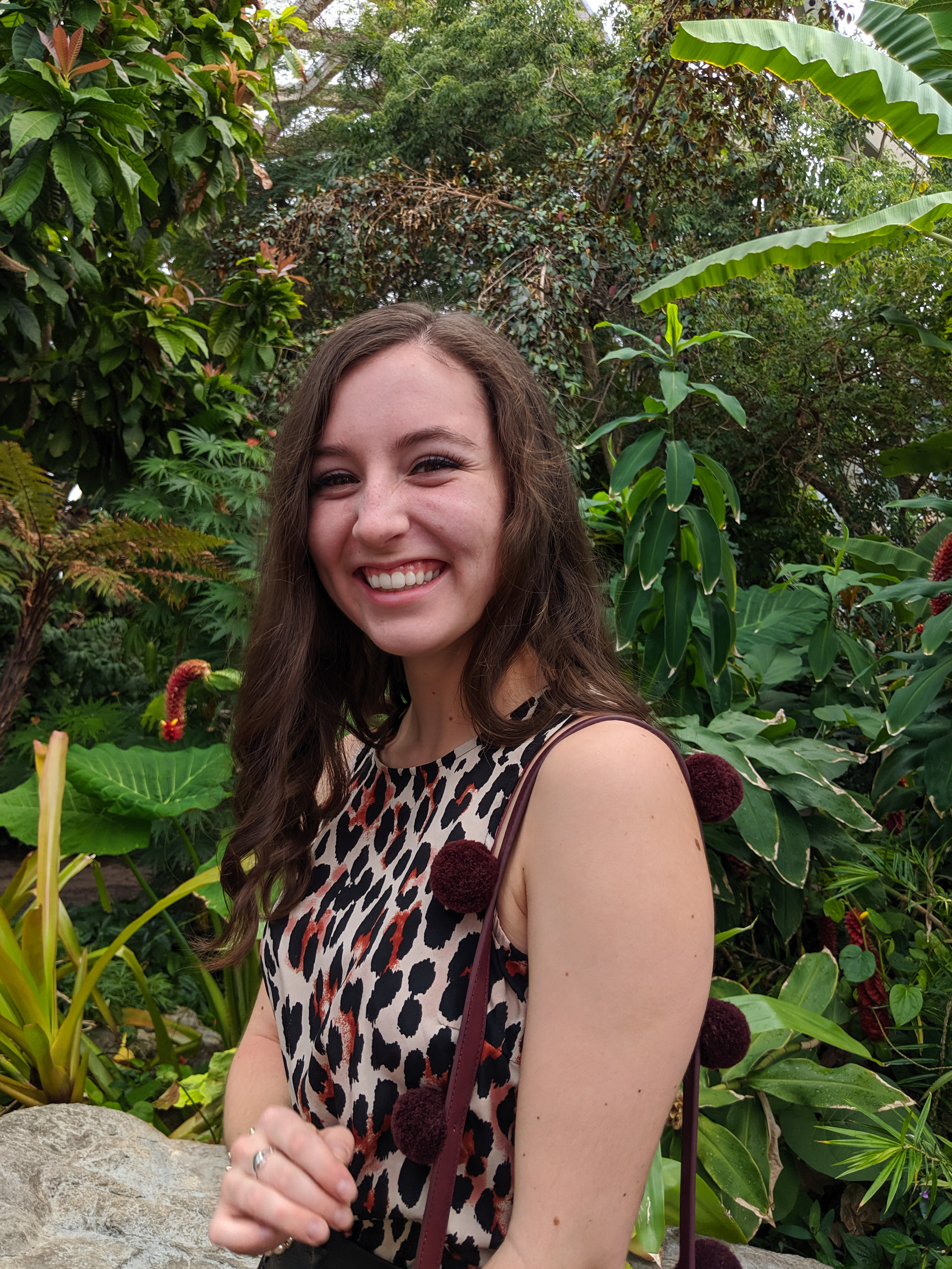 fall outfit, curled hair, leopard print, pom poms