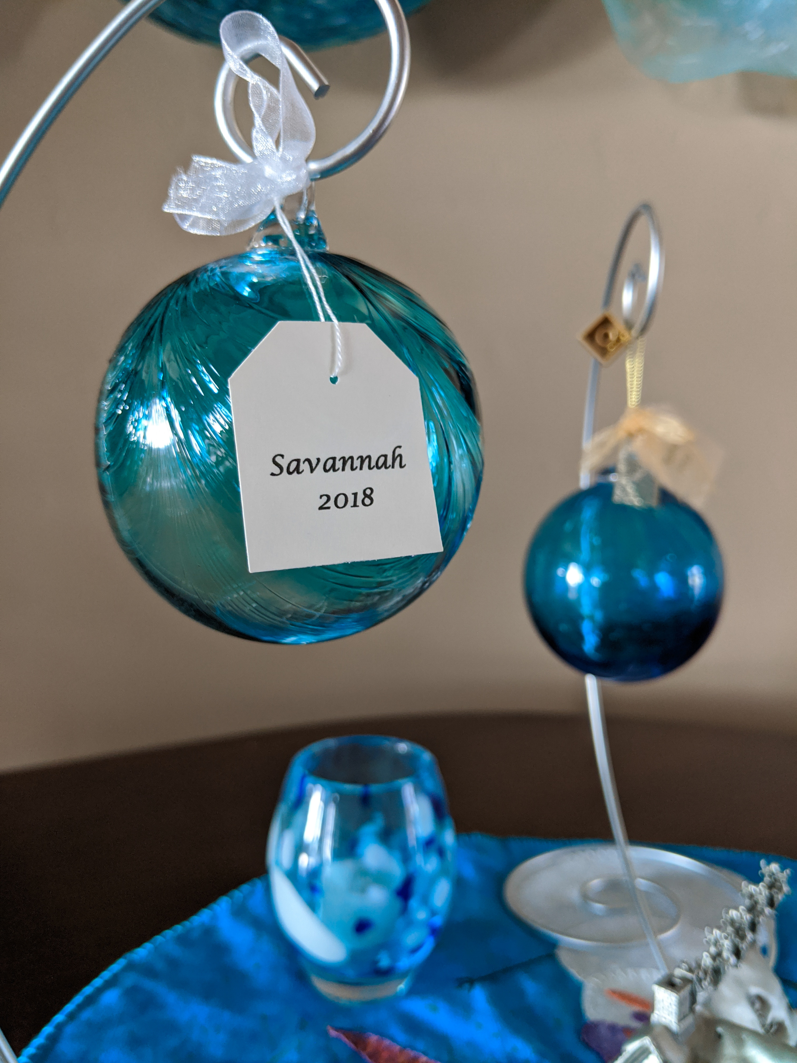 gifts that give back, blue ornaments