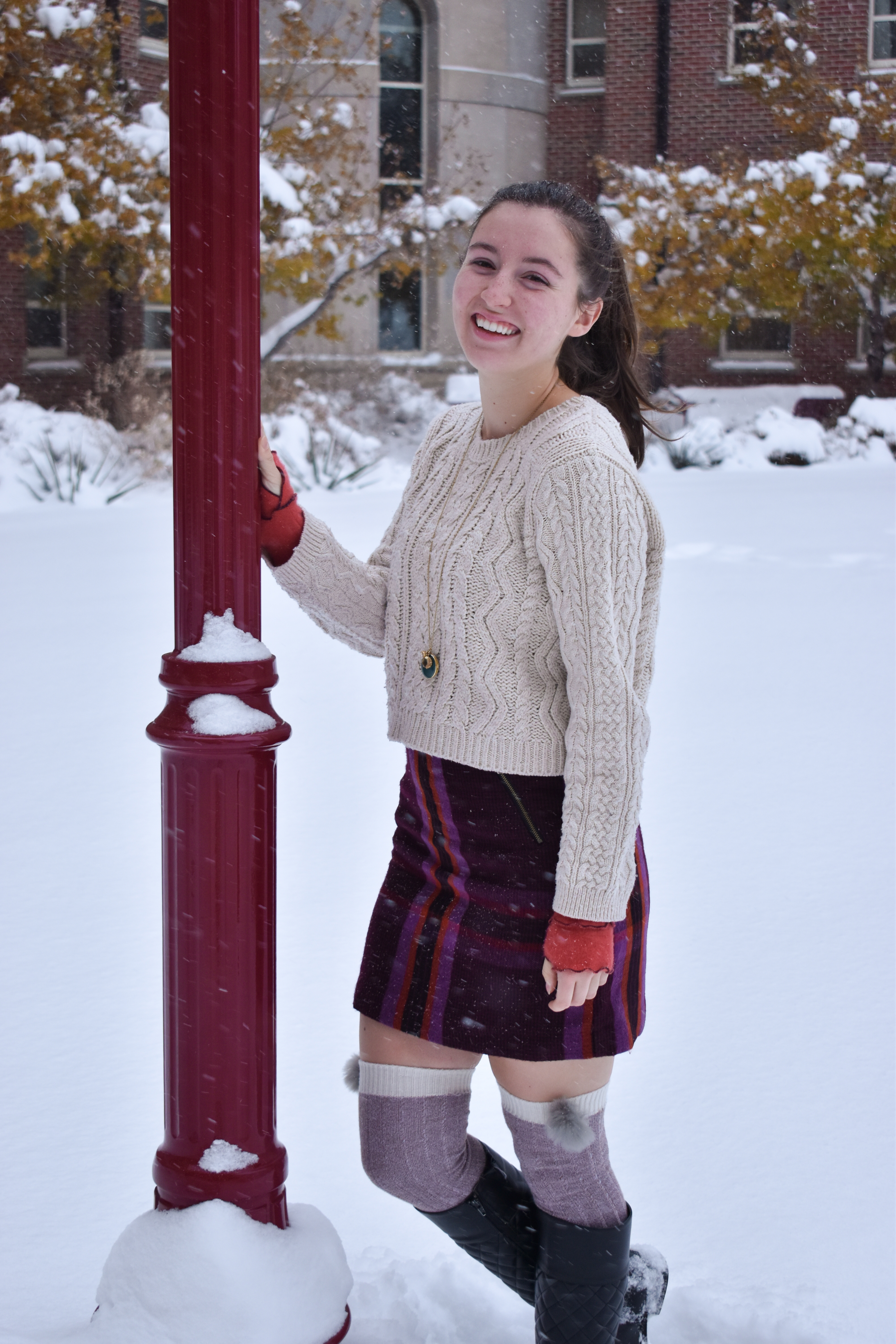 plaid skirt, knee socks, black riding boots, cableknit sweater