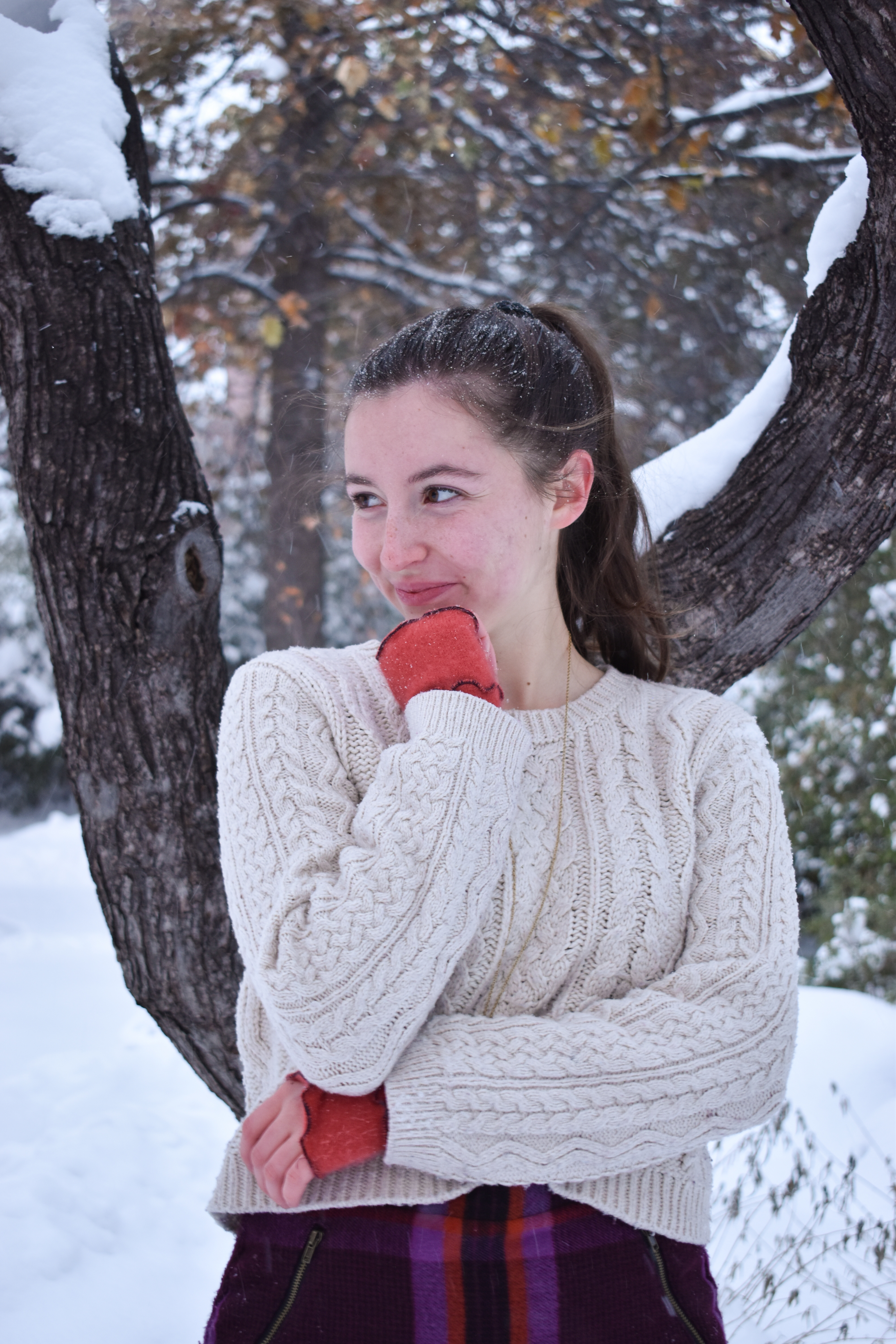 fingerless gloves, cableknit sweater, plaid skirt