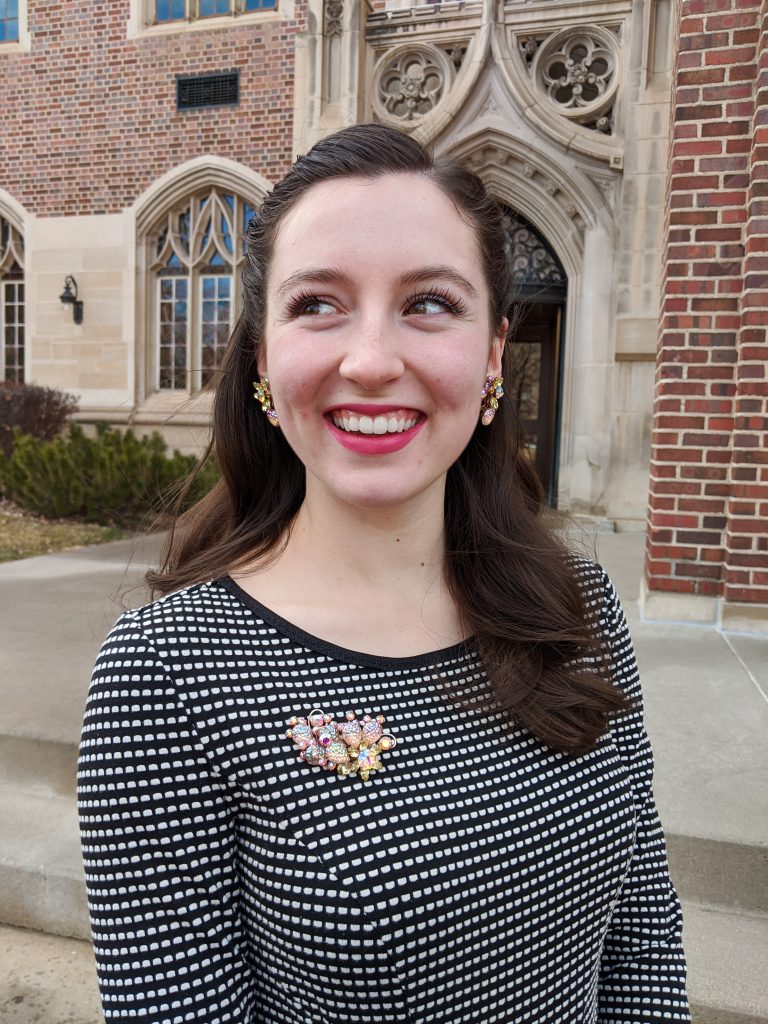 bold lipstick, clip-on earrings, heirloom jewelry, brooches