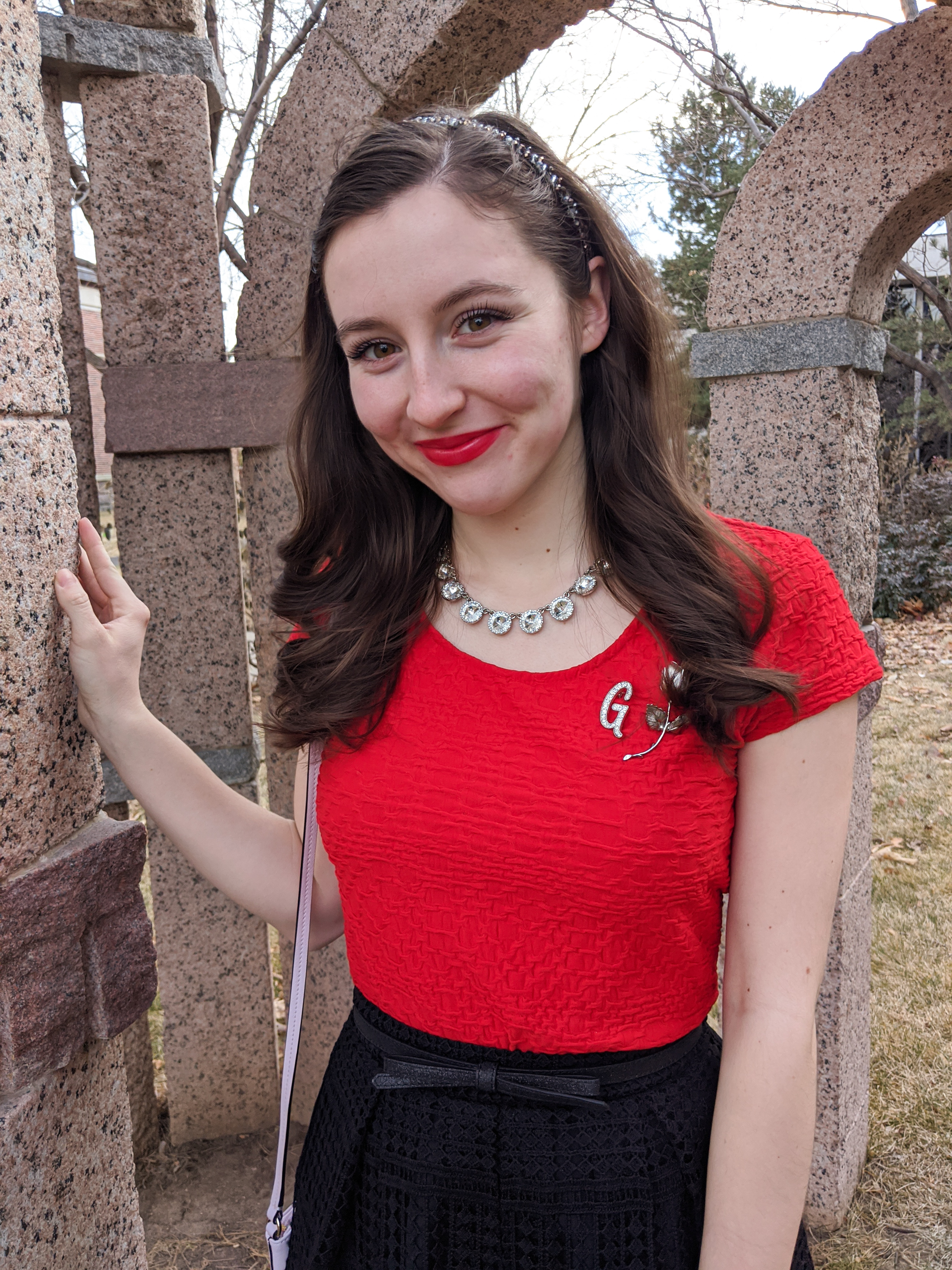 sparkly headband, sassy red lipstick, bold red, brooches