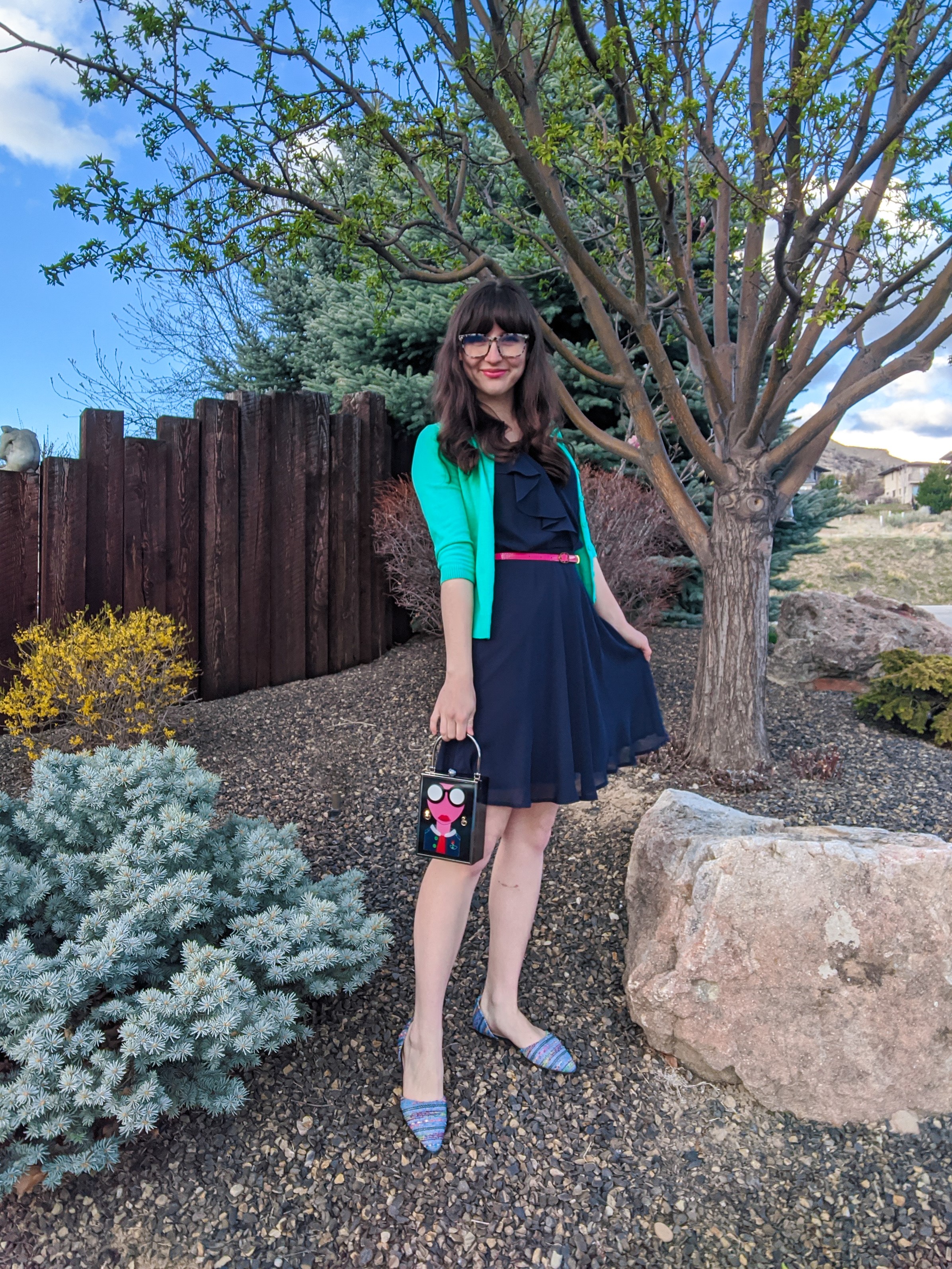 navy dress, dorsay flats, box purse, green cardigan
