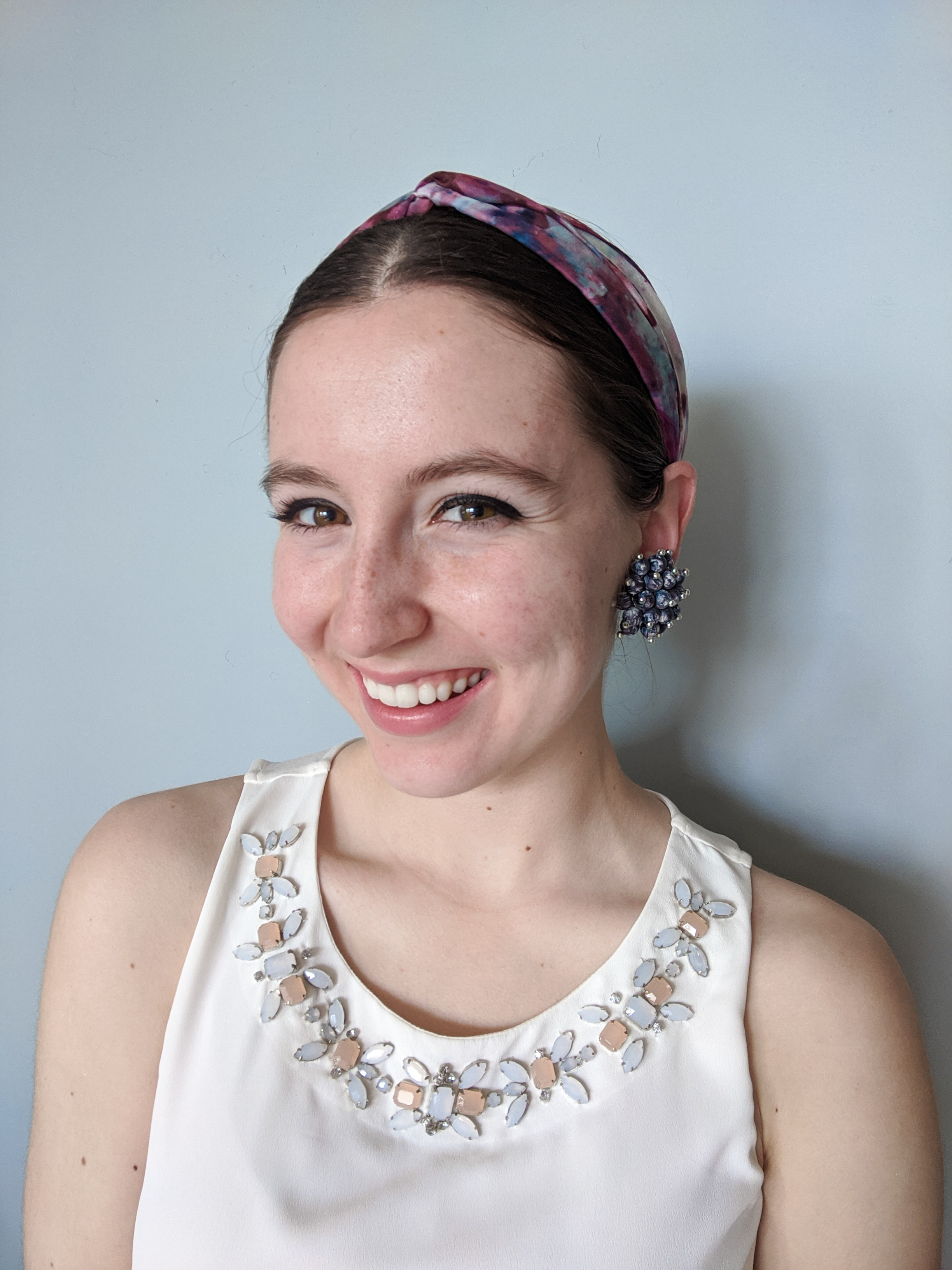 clip-on earring, bedazzled blouse, quarantine hair, third day hair