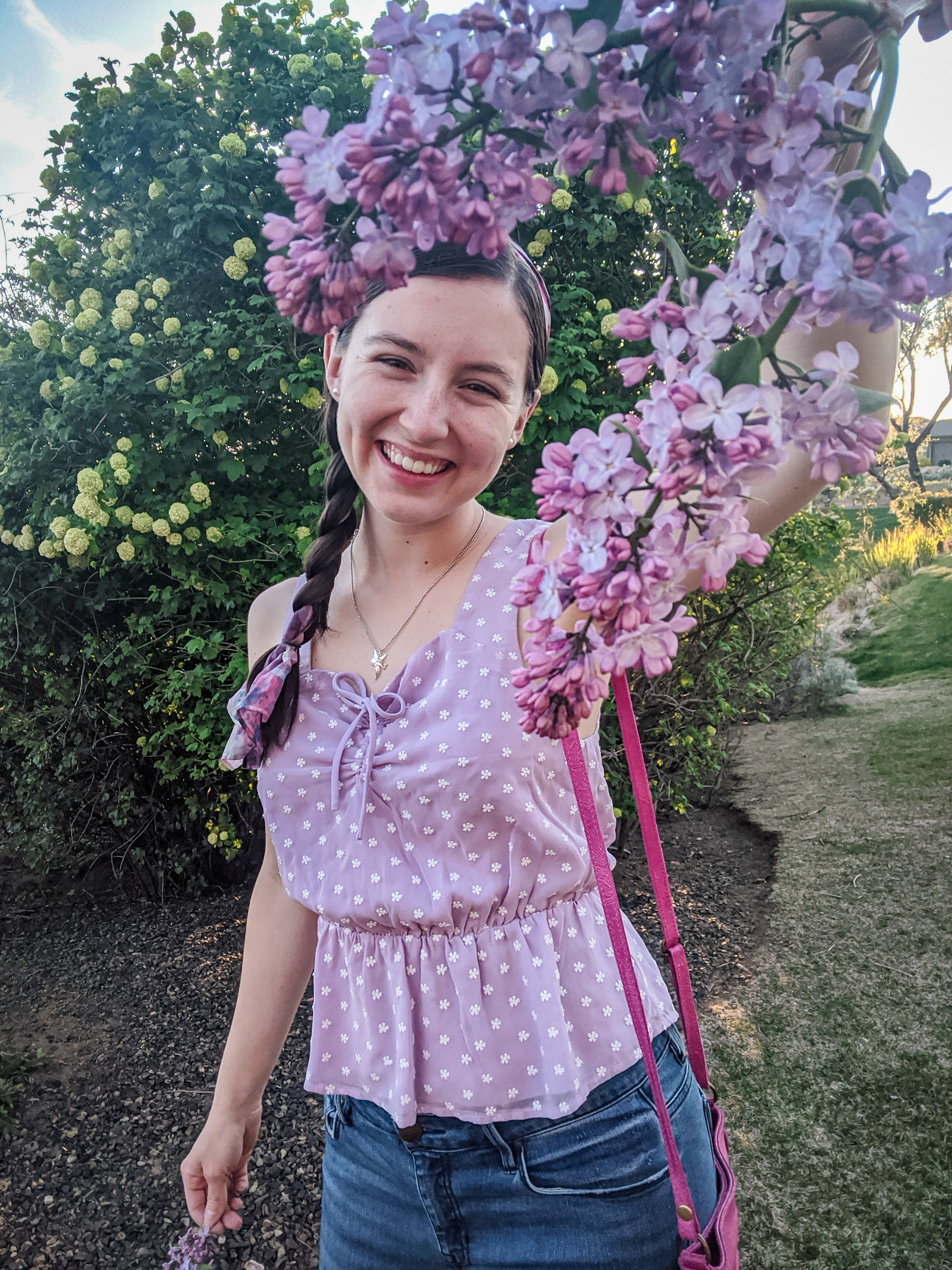 lilacs, purple blouse, blue jeans