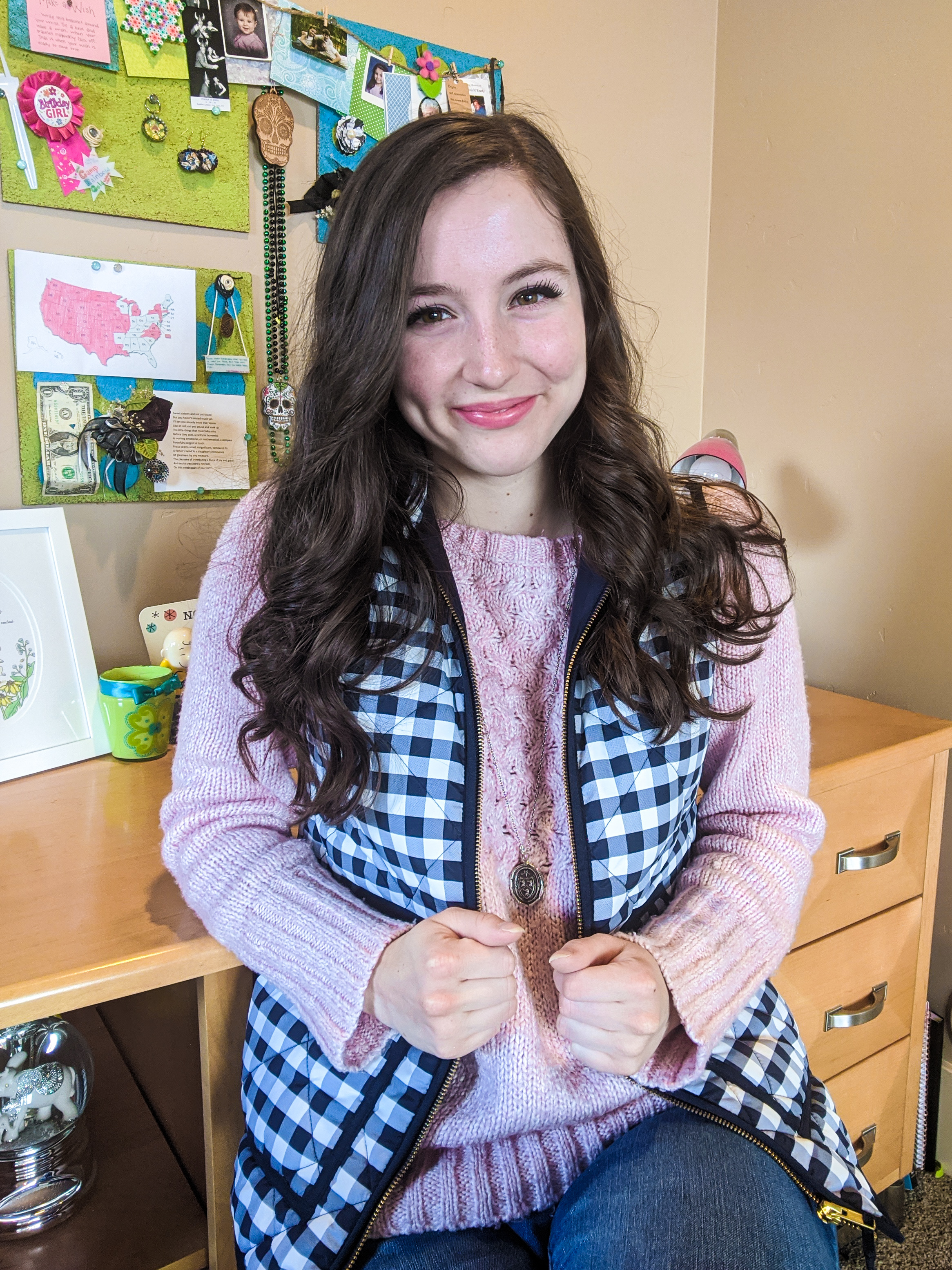 pink sweater, jeans, navy vest, online classes