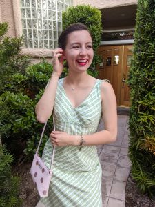 pearl-necklace-red-lipstick-retro-hairstyle-green-sundress