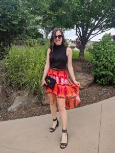 orange-skirt-summer-outfit-black-mock-neck