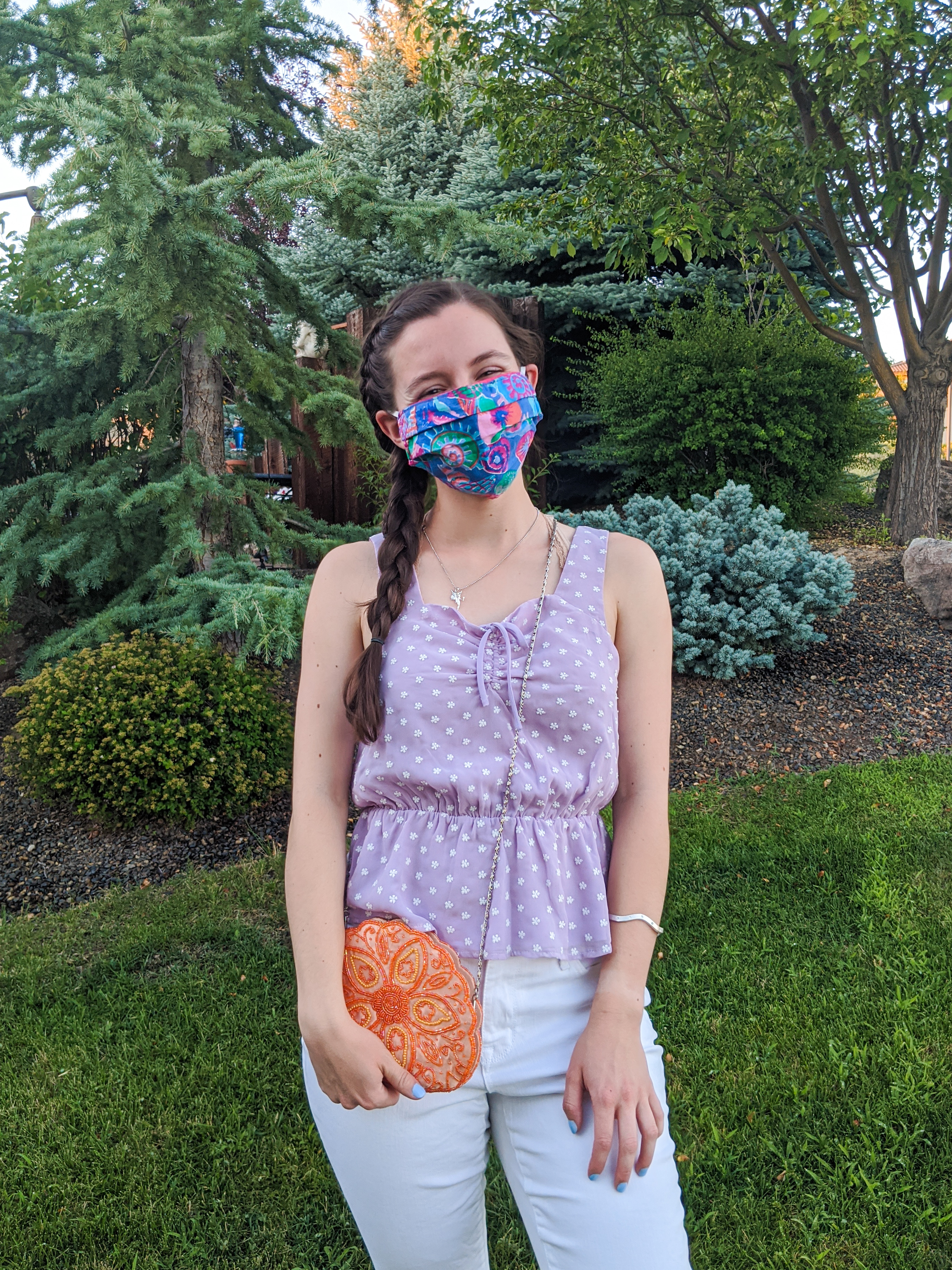 lavender-top-orange-purse-colorful-face-mask