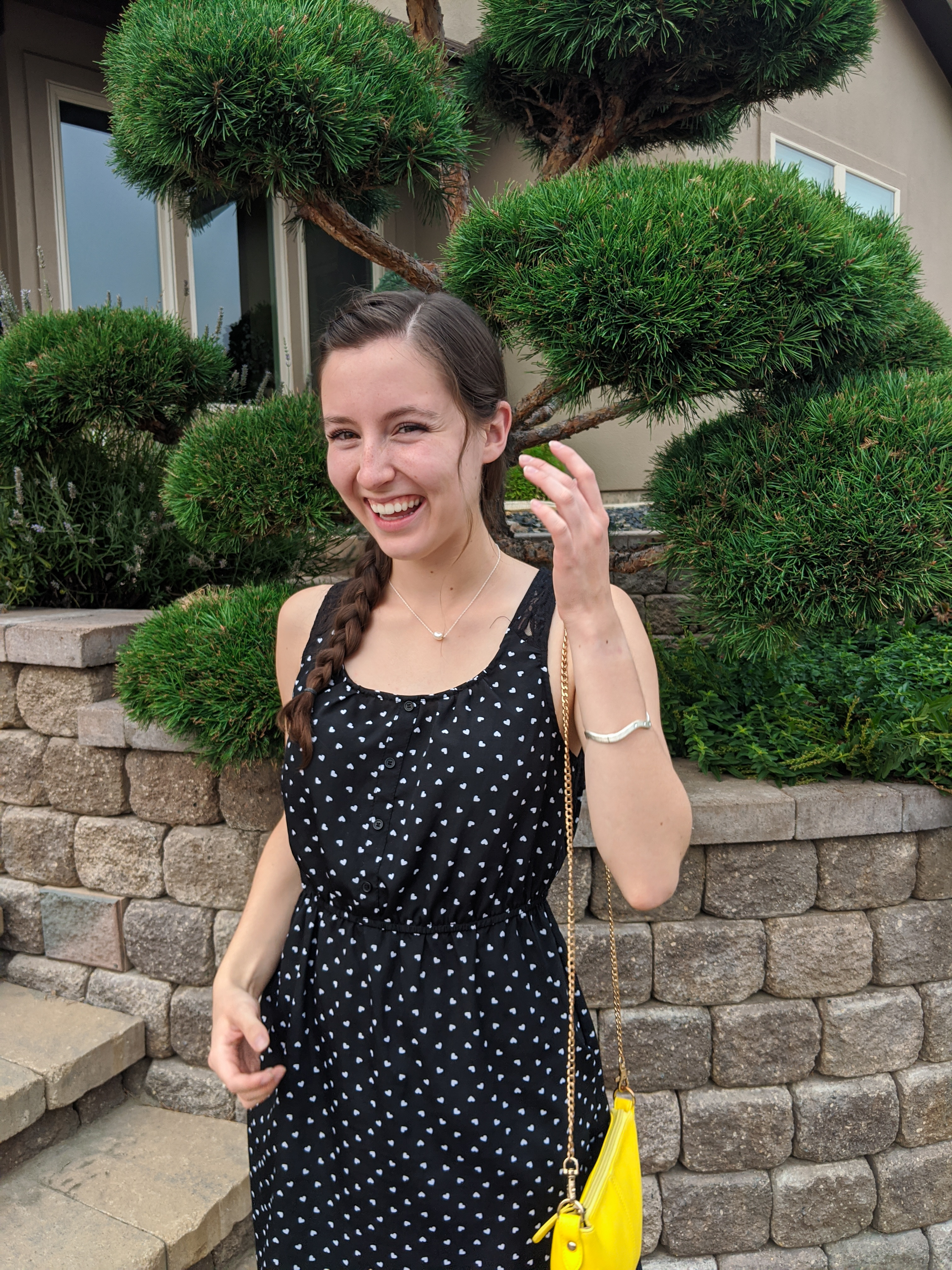dotted-dress-yellow-purse-pearl-necklace-side-braid