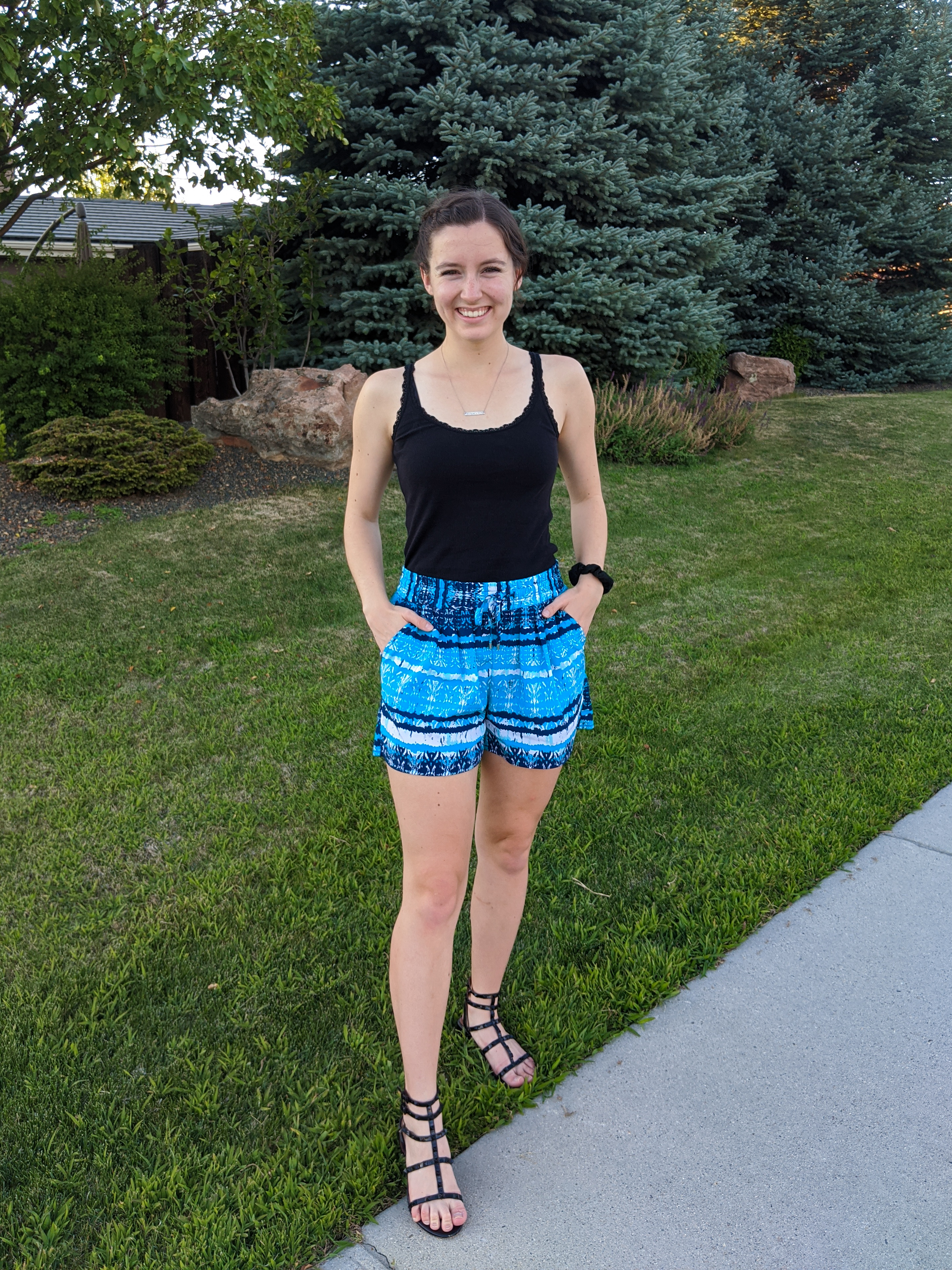turquoise-shorts-black-tank-black-sandals-college-fashion