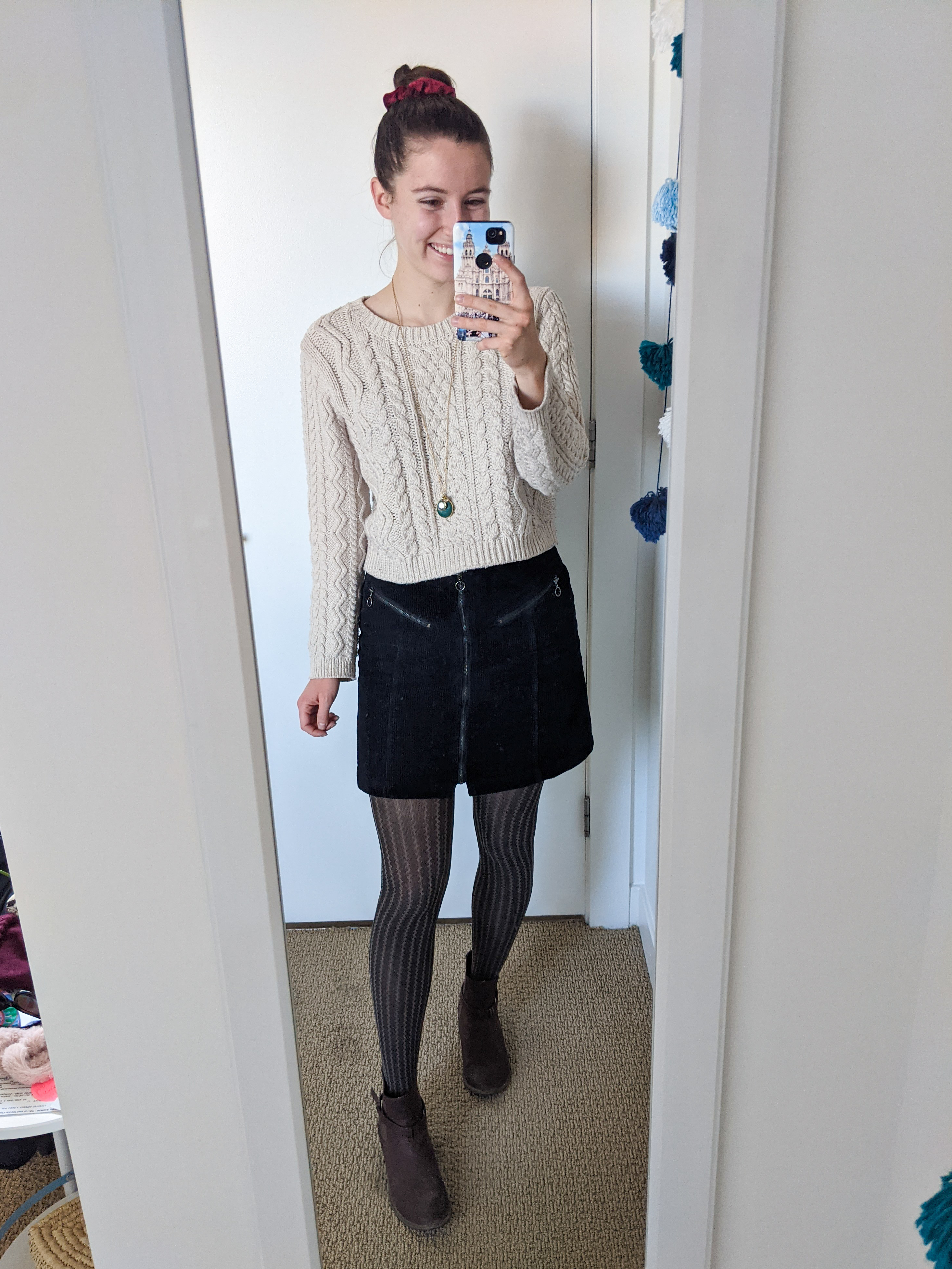 beige-sweater-cableknit-black-corduroy-skirt-patterned-tights